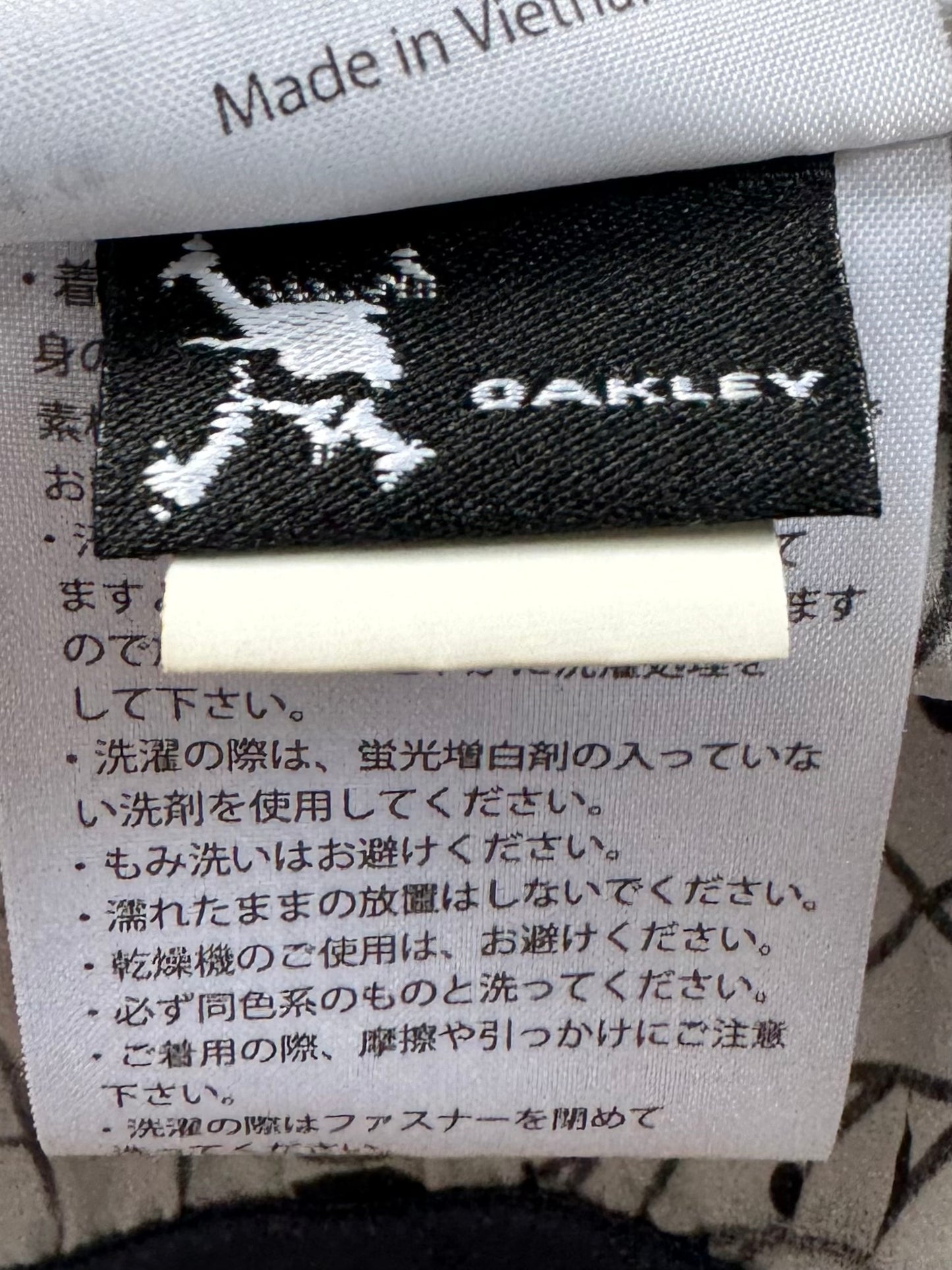 Vintage 2000's checkered snow camo Oakley technical jacket (S)