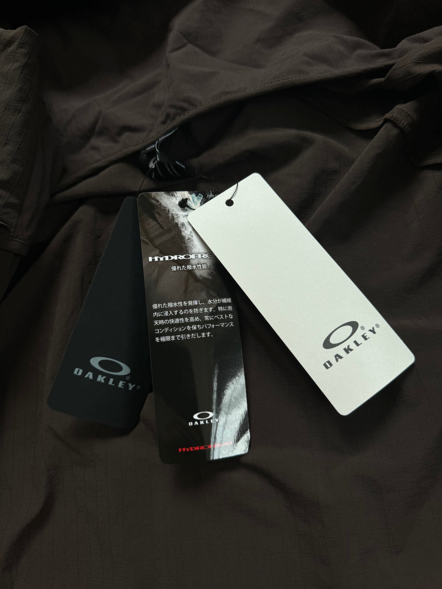 Brown and black Oakley Technical jacket (M)