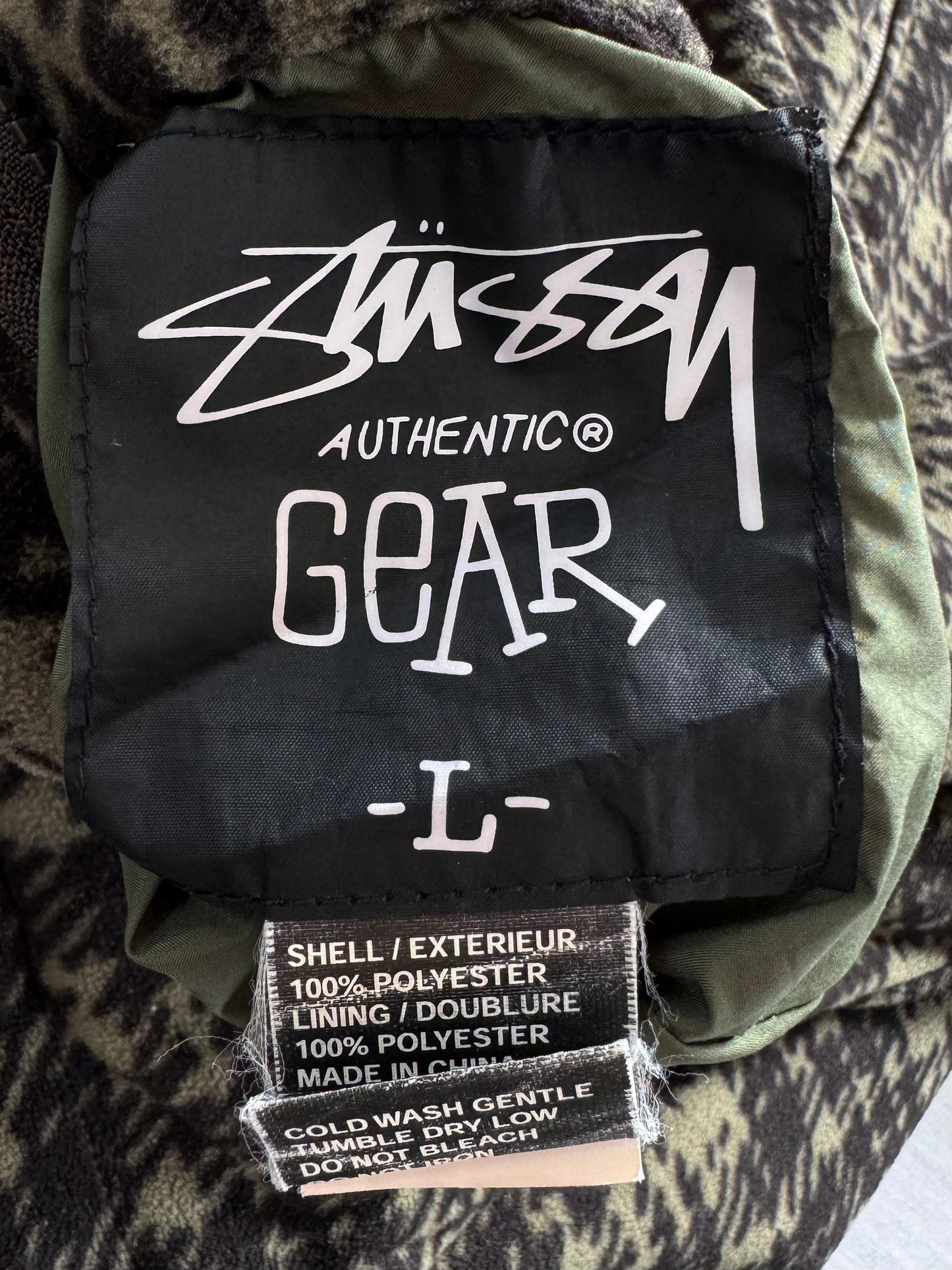 Vintage 2000's khaki green and black Stussy reversible plaid / tartan technical jacket (M)