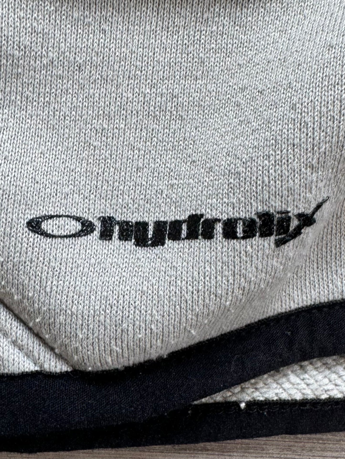 Vintage 2000's black and light grey Oakley graphic print logo zip up technical hoodie (M)