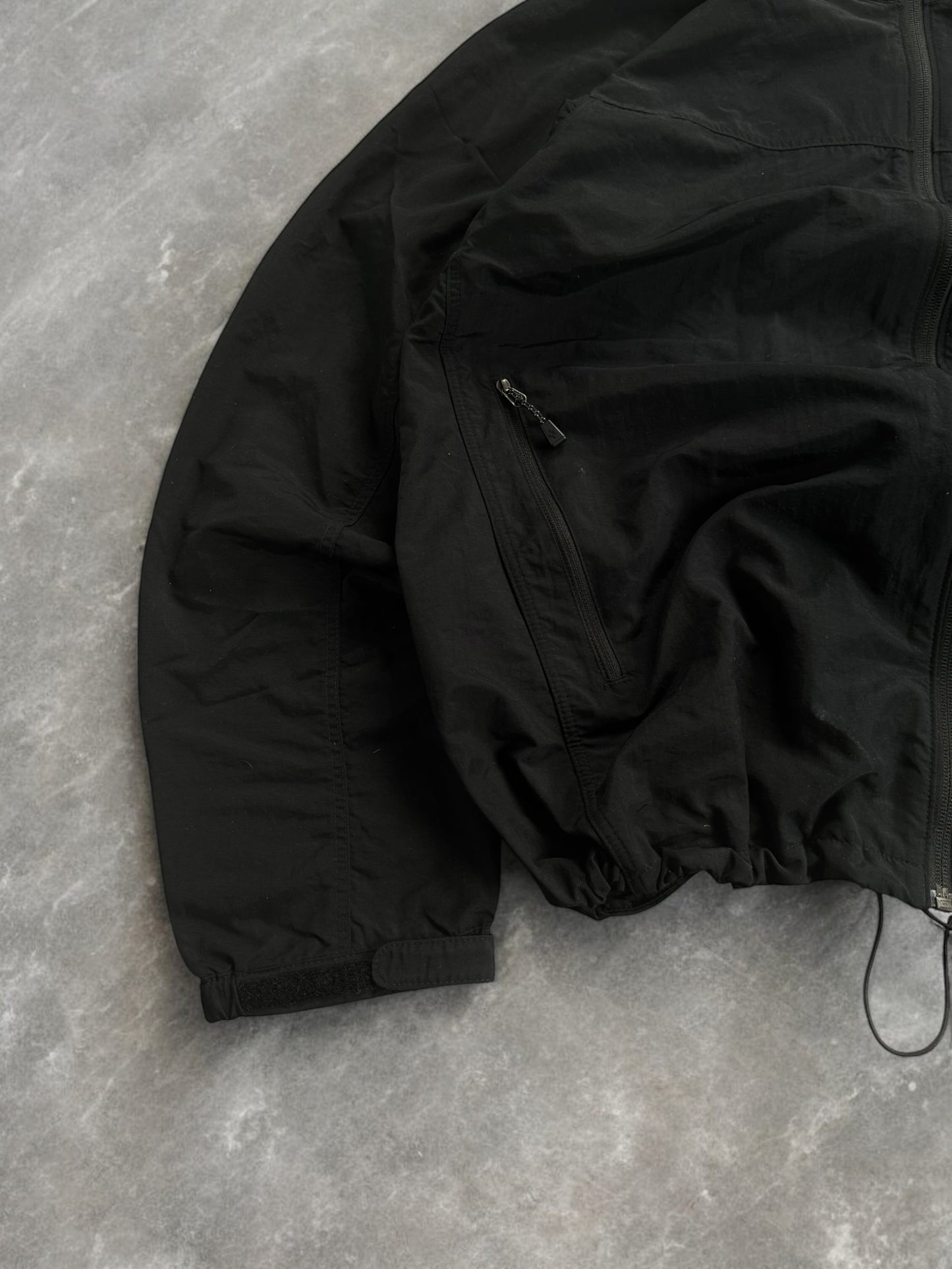 Black Montbell technical light weight jacket (L)