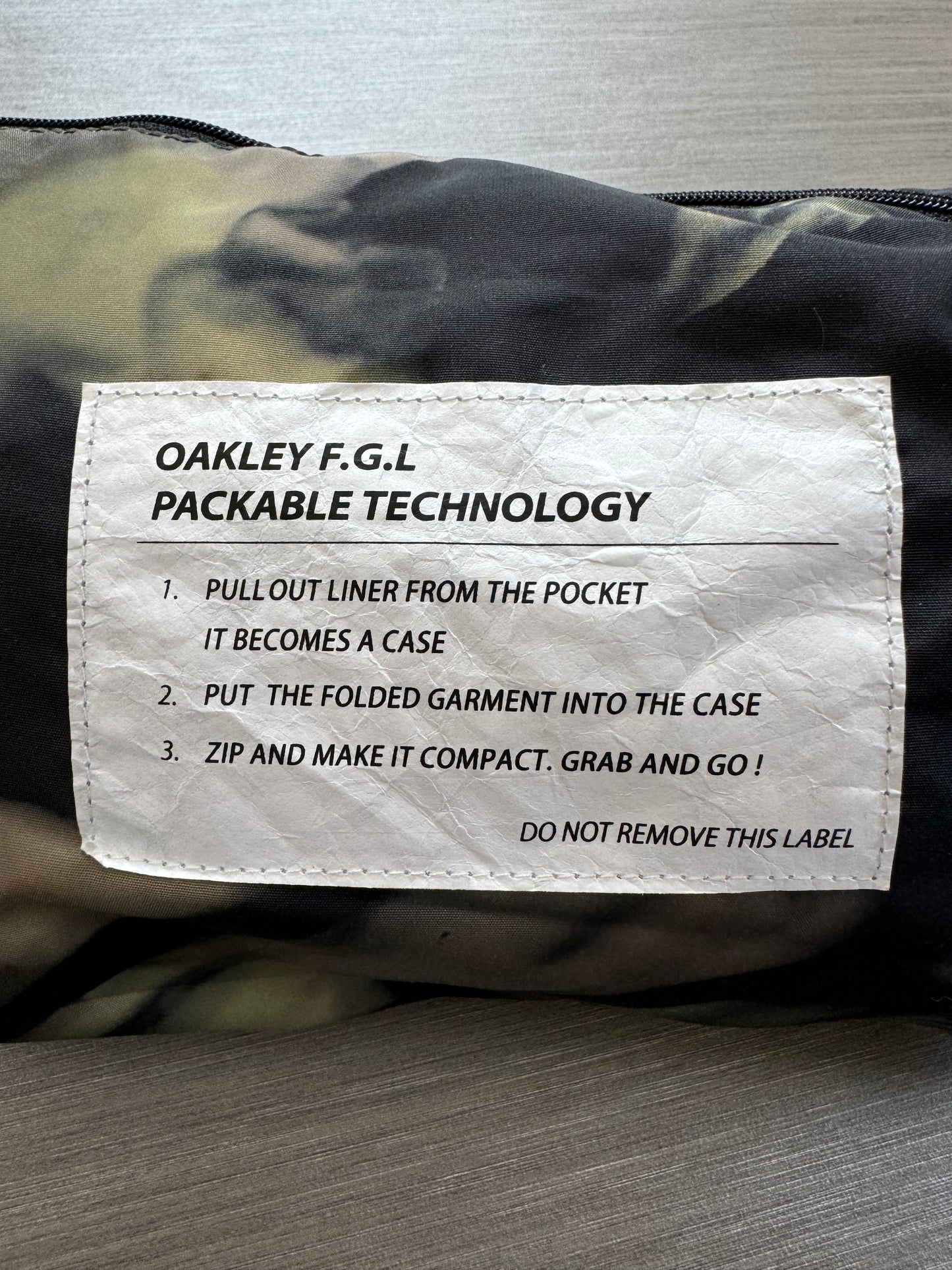 Vintage black Oakley FGL technical packable jacket (M)