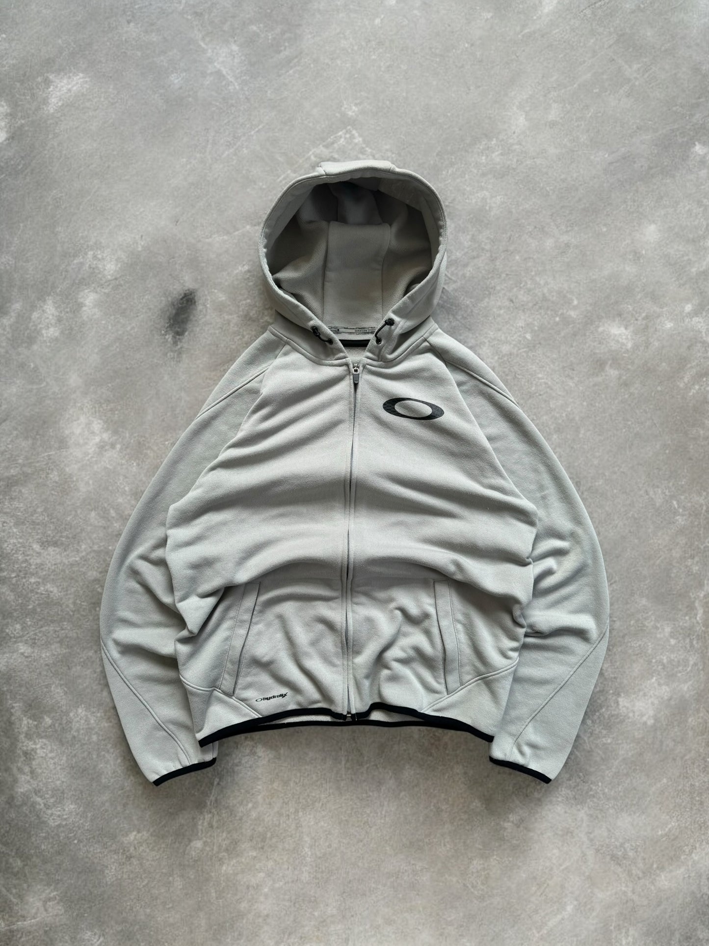Vintage 2000's black and light grey Oakley graphic print logo zip up technical hoodie (M)