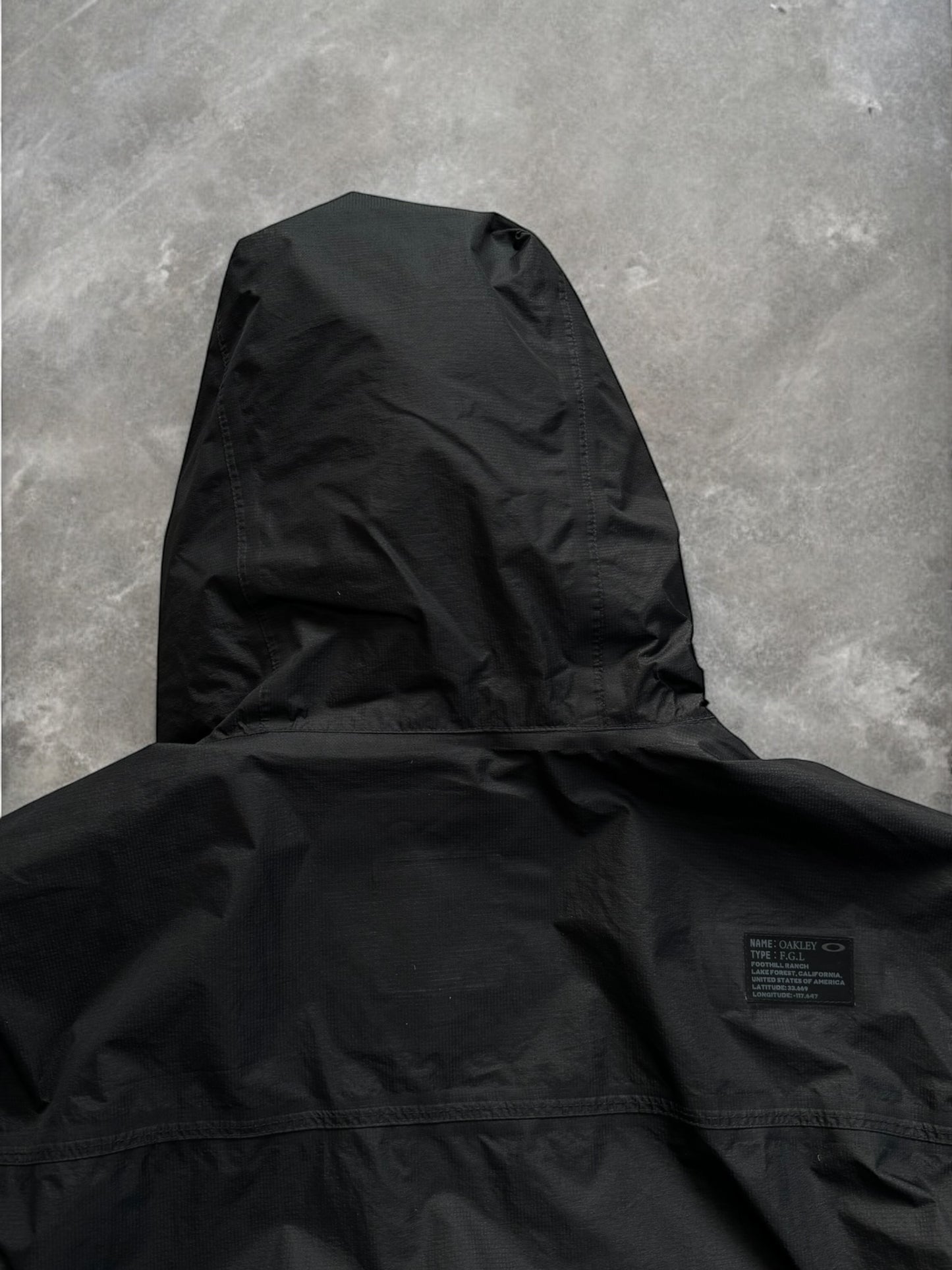 Vintage black Oakley FGL technical packable jacket (M)