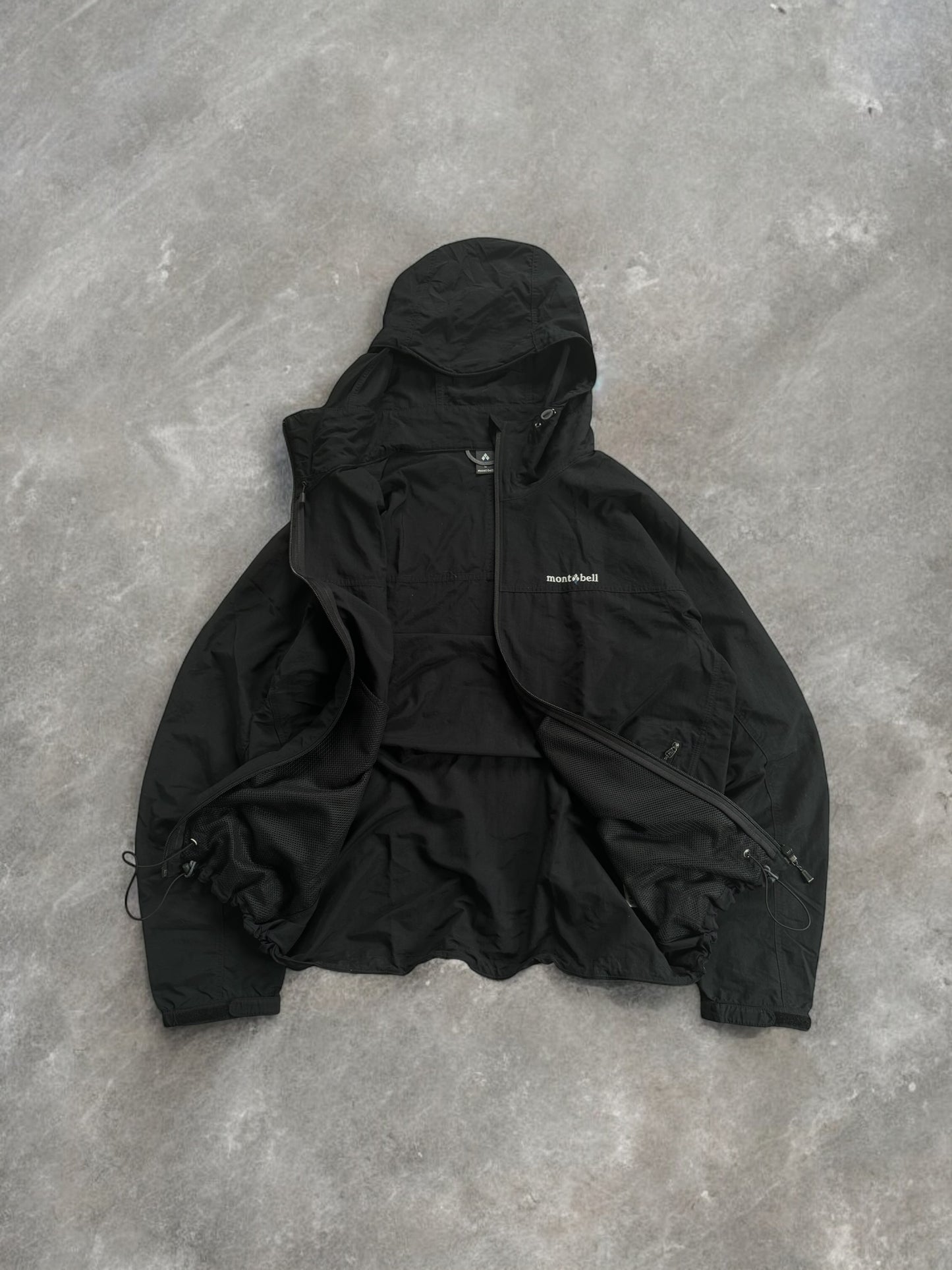 Black Montbell technical light weight jacket (L)