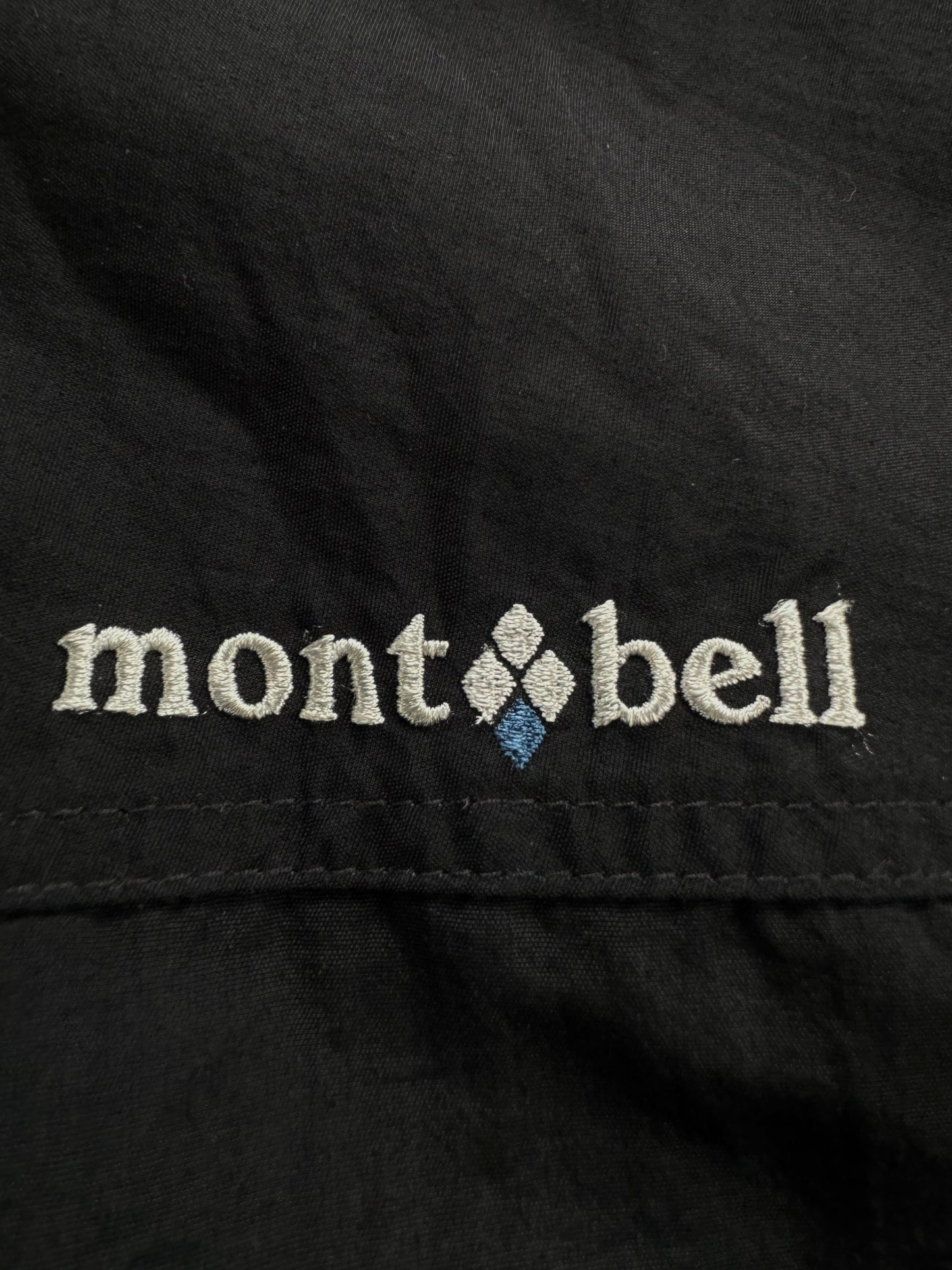 Black Montbell technical light weight jacket (L)