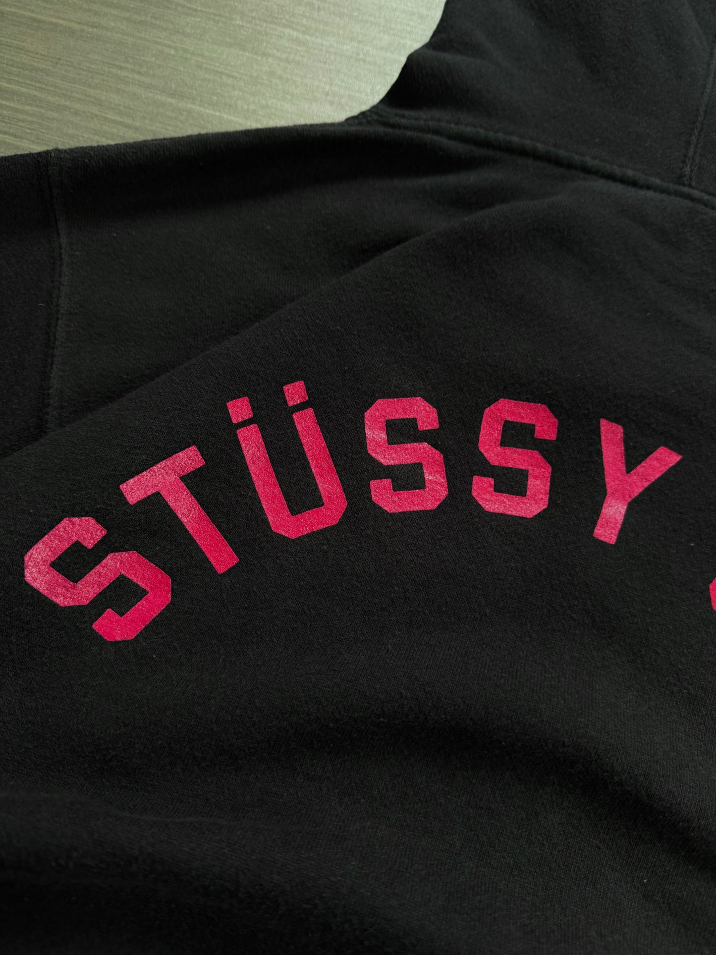 Vintage 2000's black and pink Stussy graphic hoodie (L)