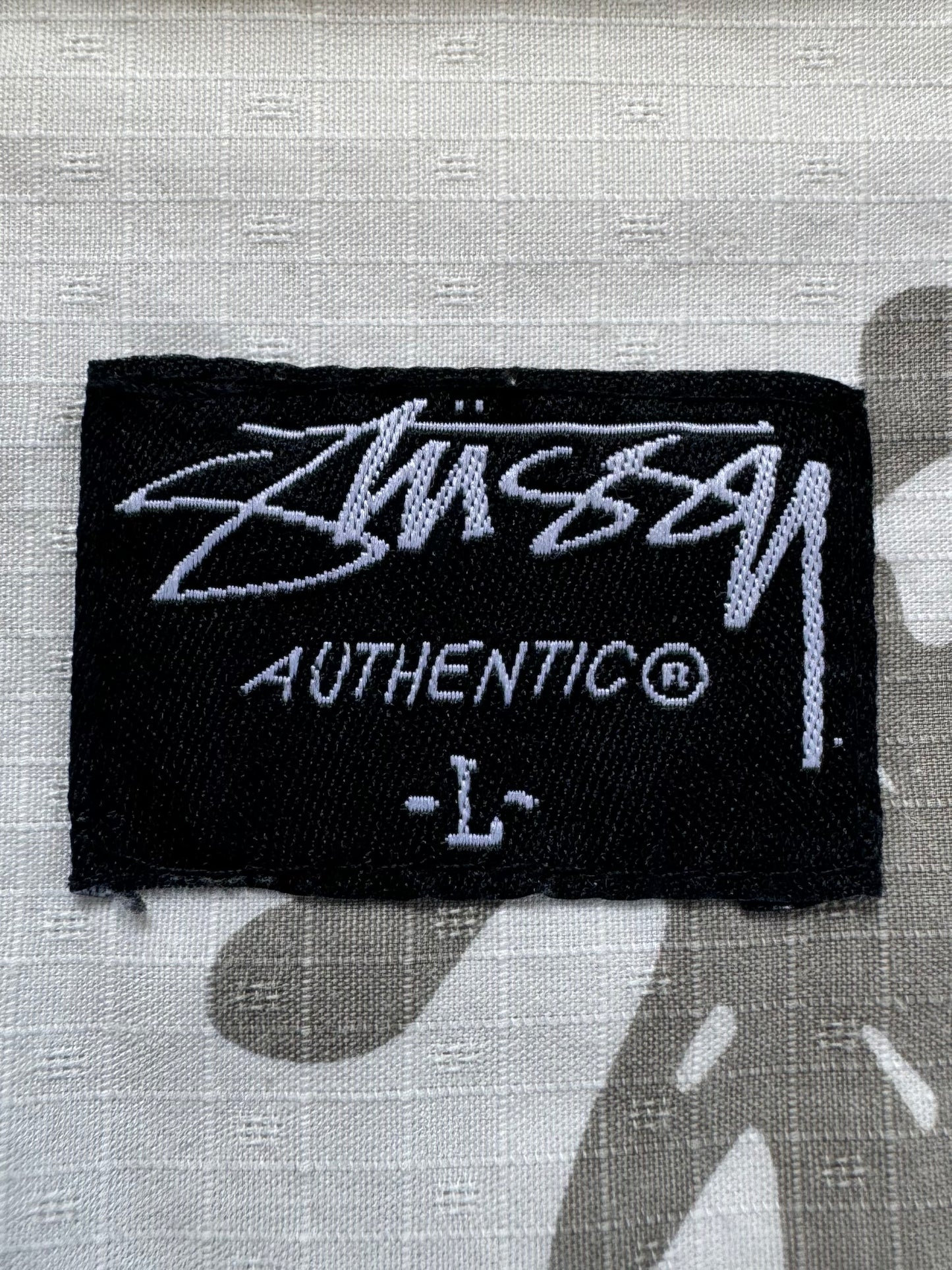 Vintage 2000's white and grey graphic print stussy button up short sleeve cargo shirt (L)