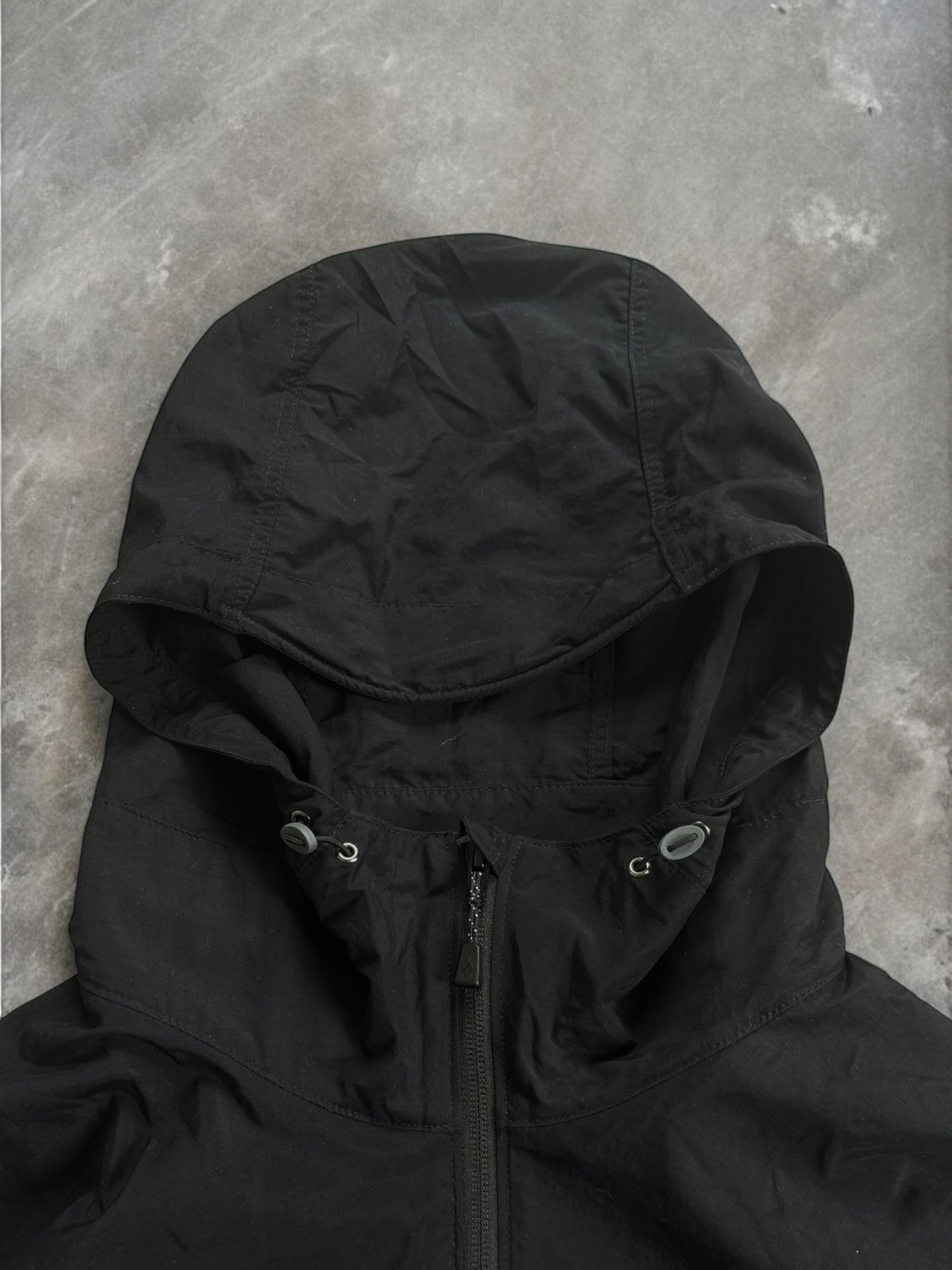 Black Montbell technical light weight jacket (L)