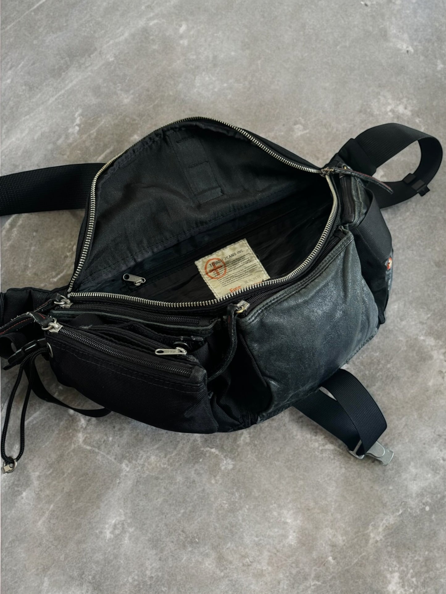 Vintage 90's black and grey archival ToughJeans
INC technical metal clip sling bag / waist bag