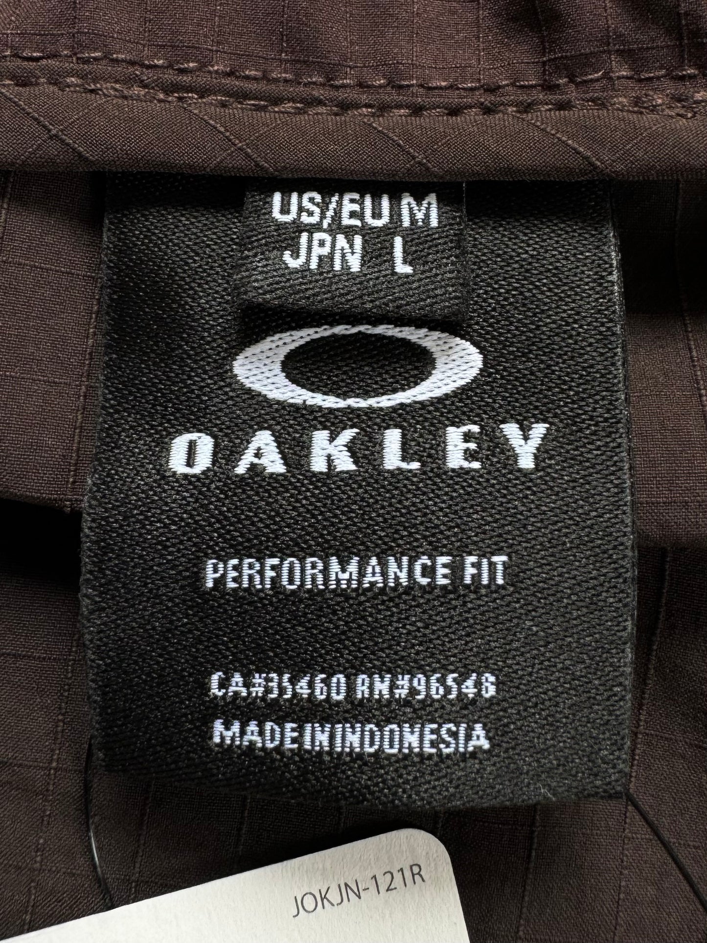 Brown and black Oakley Technical jacket (M)