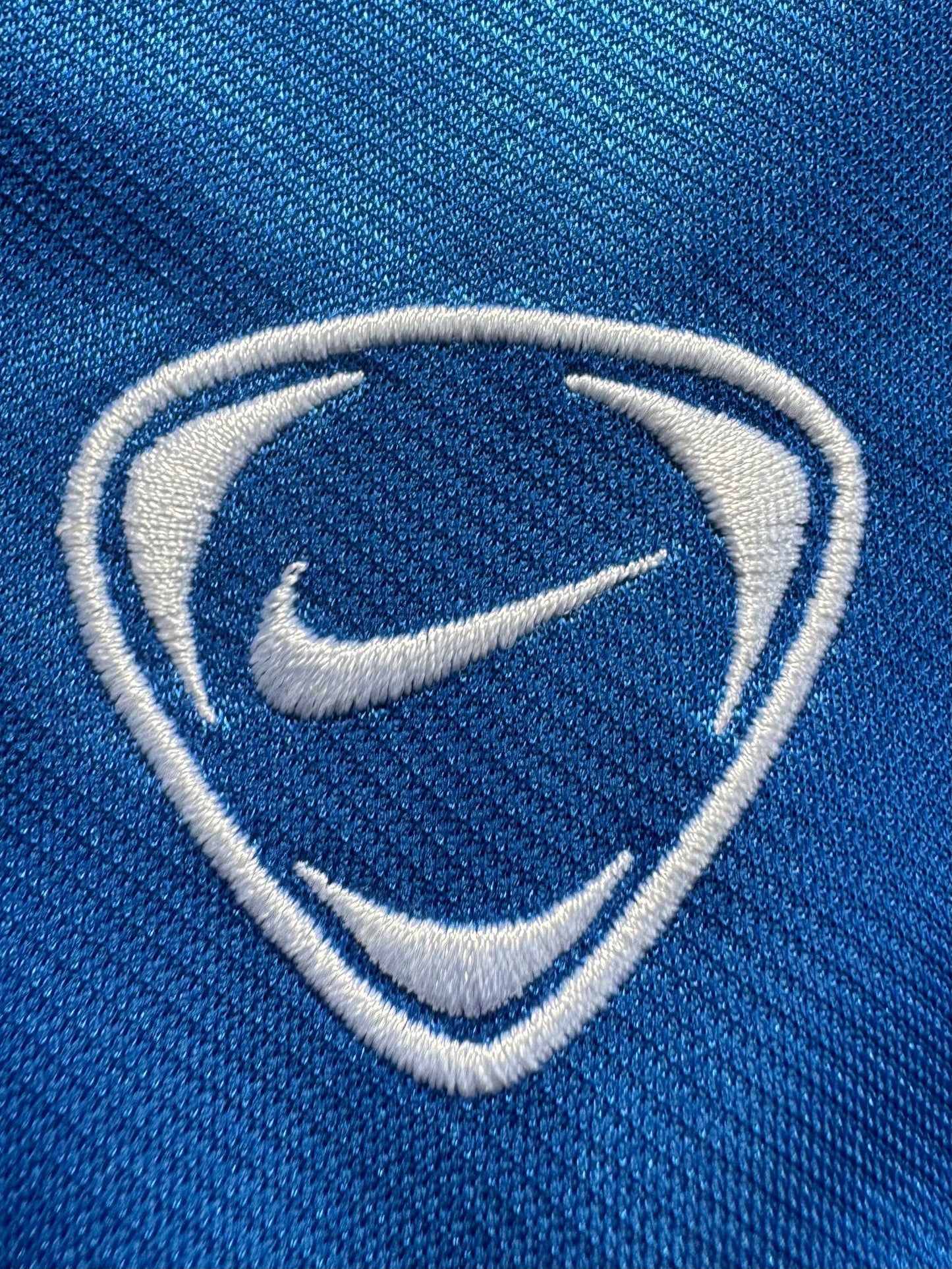 Vintage 2000's crystal blue Nike T90 embroidered swoosh crest logo technical panelled t shirt (L)