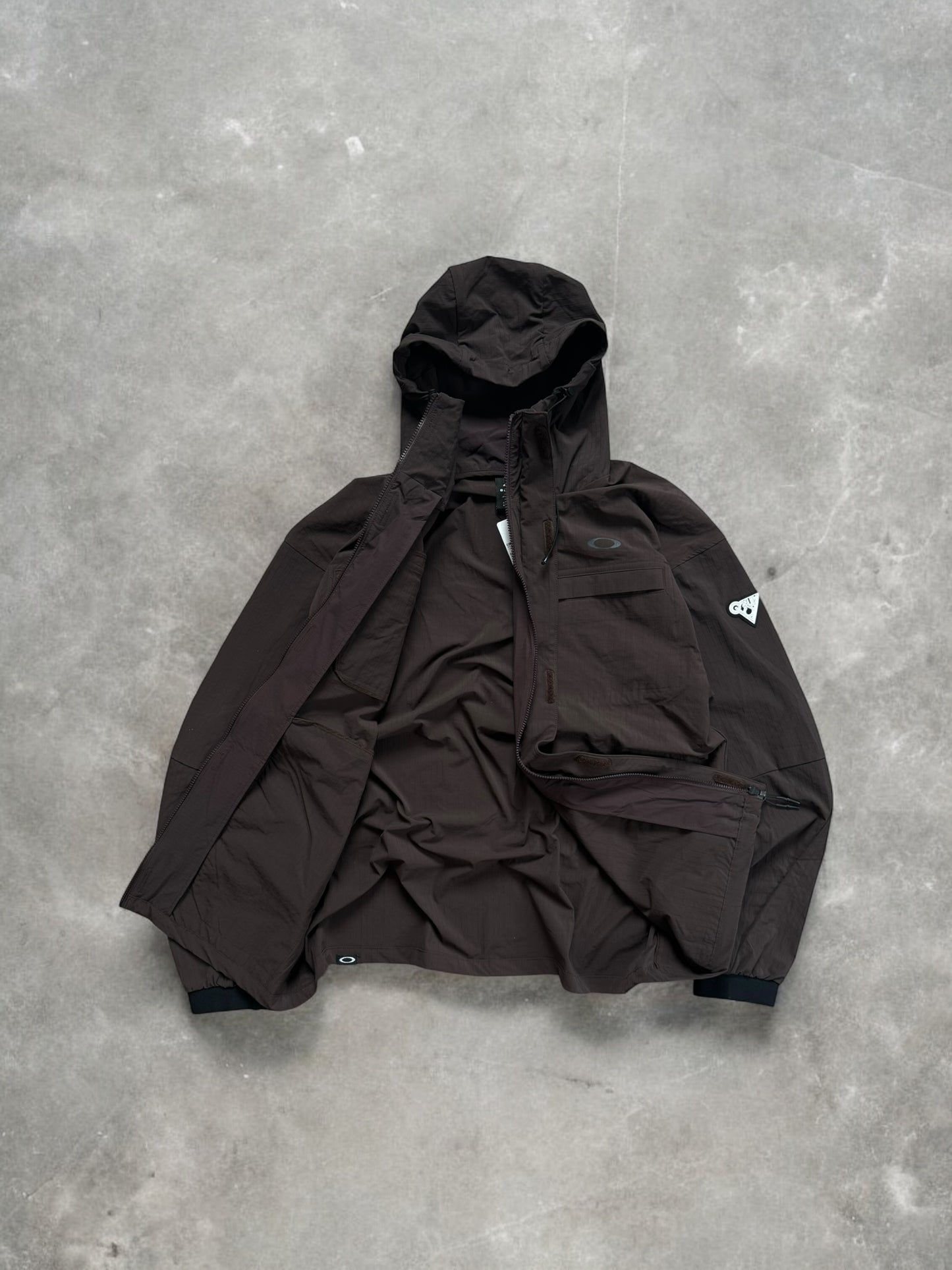 Brown and black Oakley Technical jacket (M)