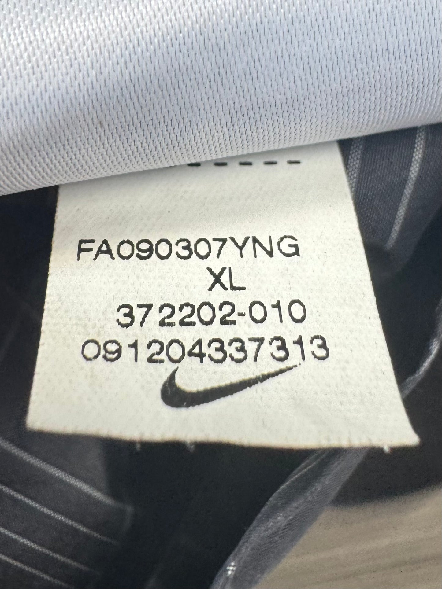 Vintage 2000's black and grey Nike embroidered swoosh logo tartan / plaid reversible technical jacket (XL)