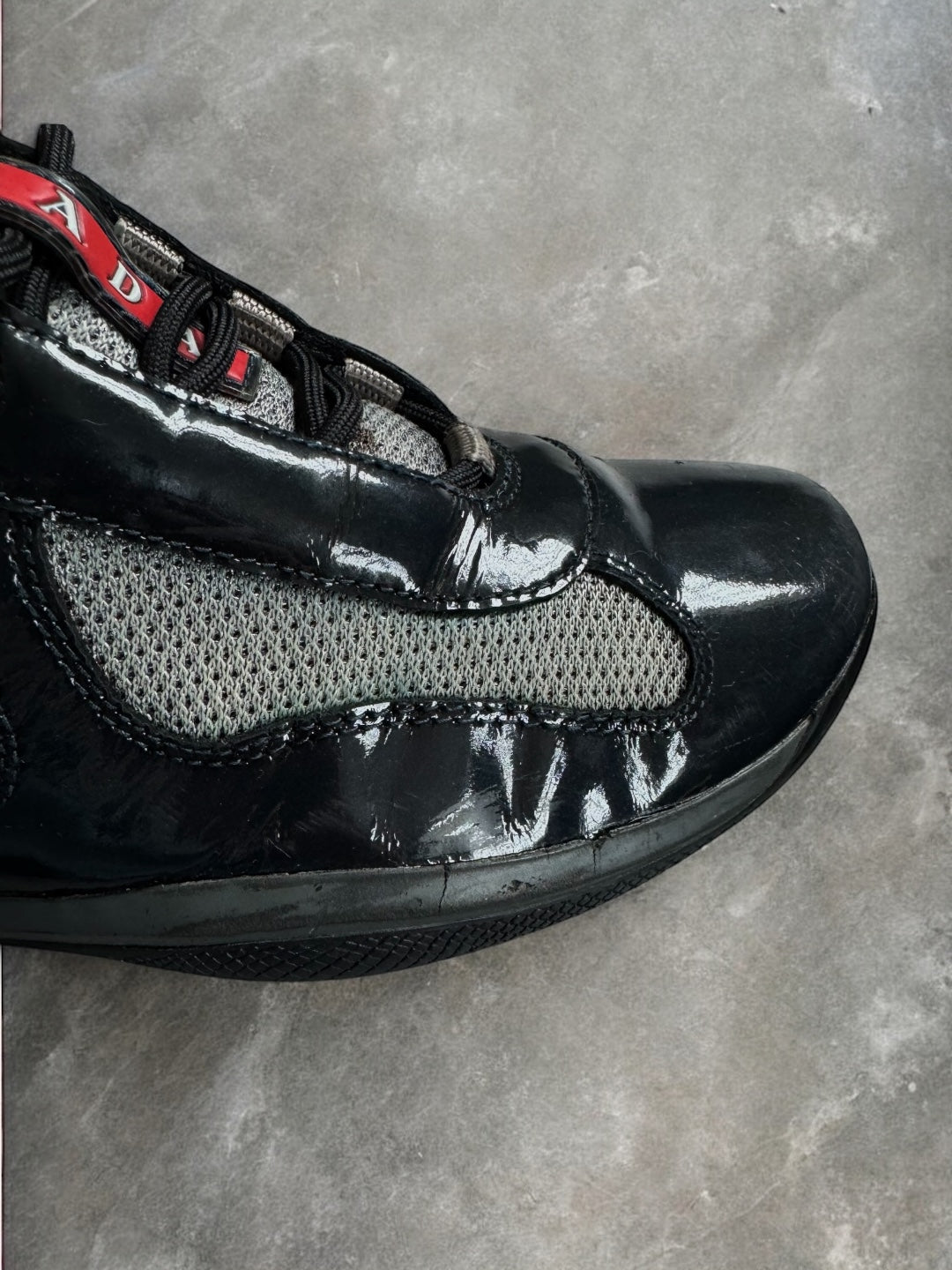 Vintage black and grey patent leather Prada America cup trainers (UK7)