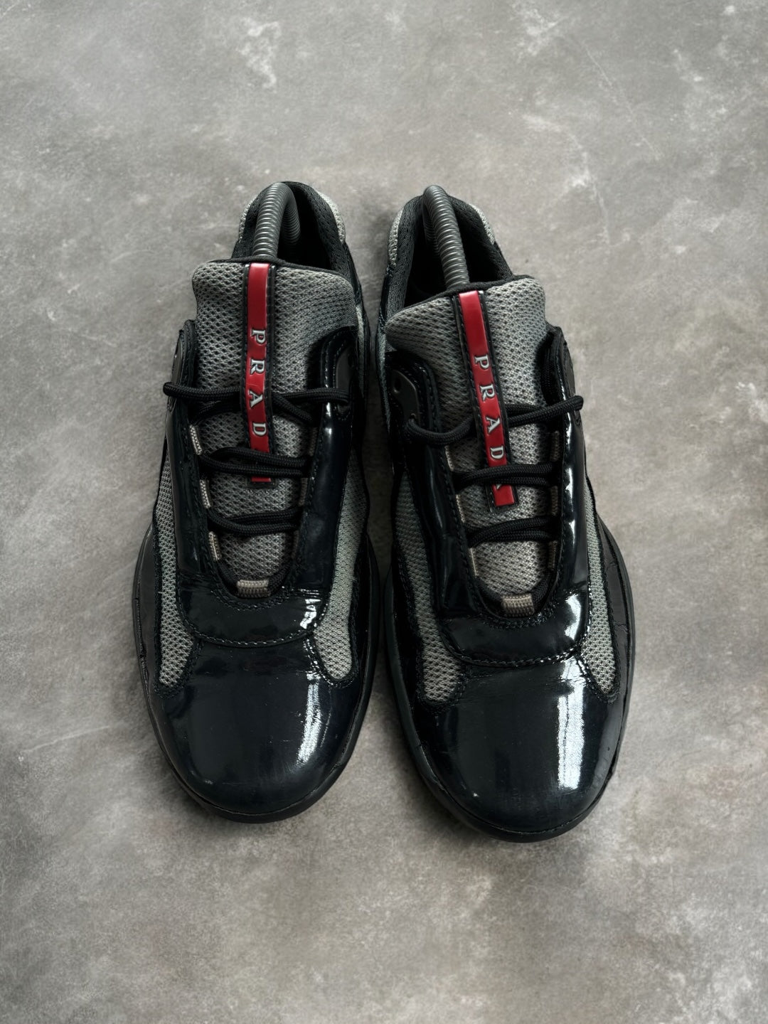 Vintage black and grey patent leather Prada America cup trainers (UK7)