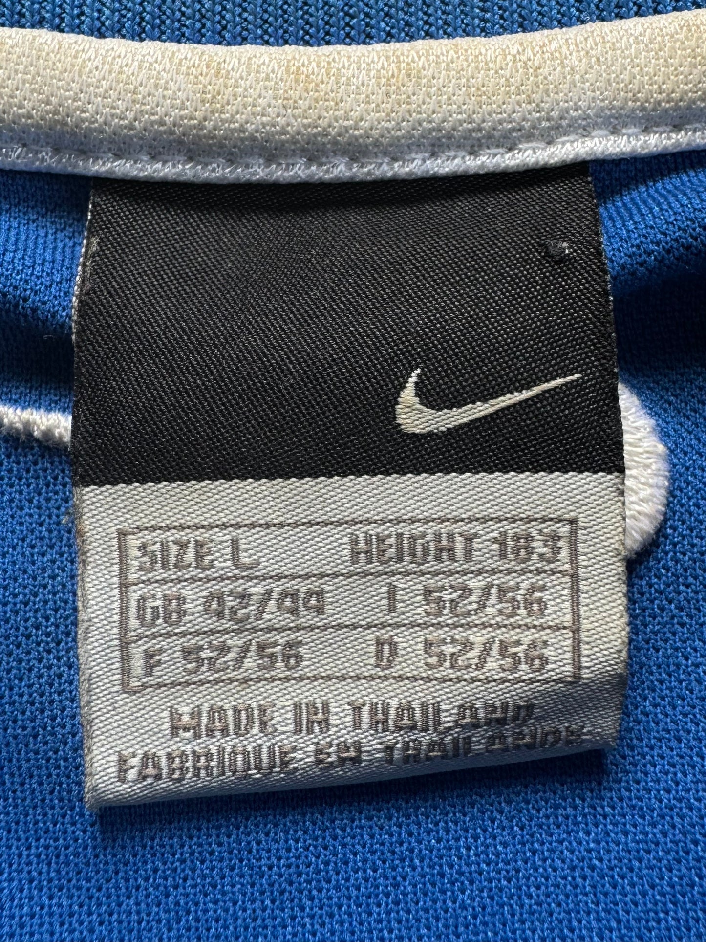 Vintage 2000's crystal blue Nike T90 embroidered swoosh crest logo technical panelled t shirt (L)