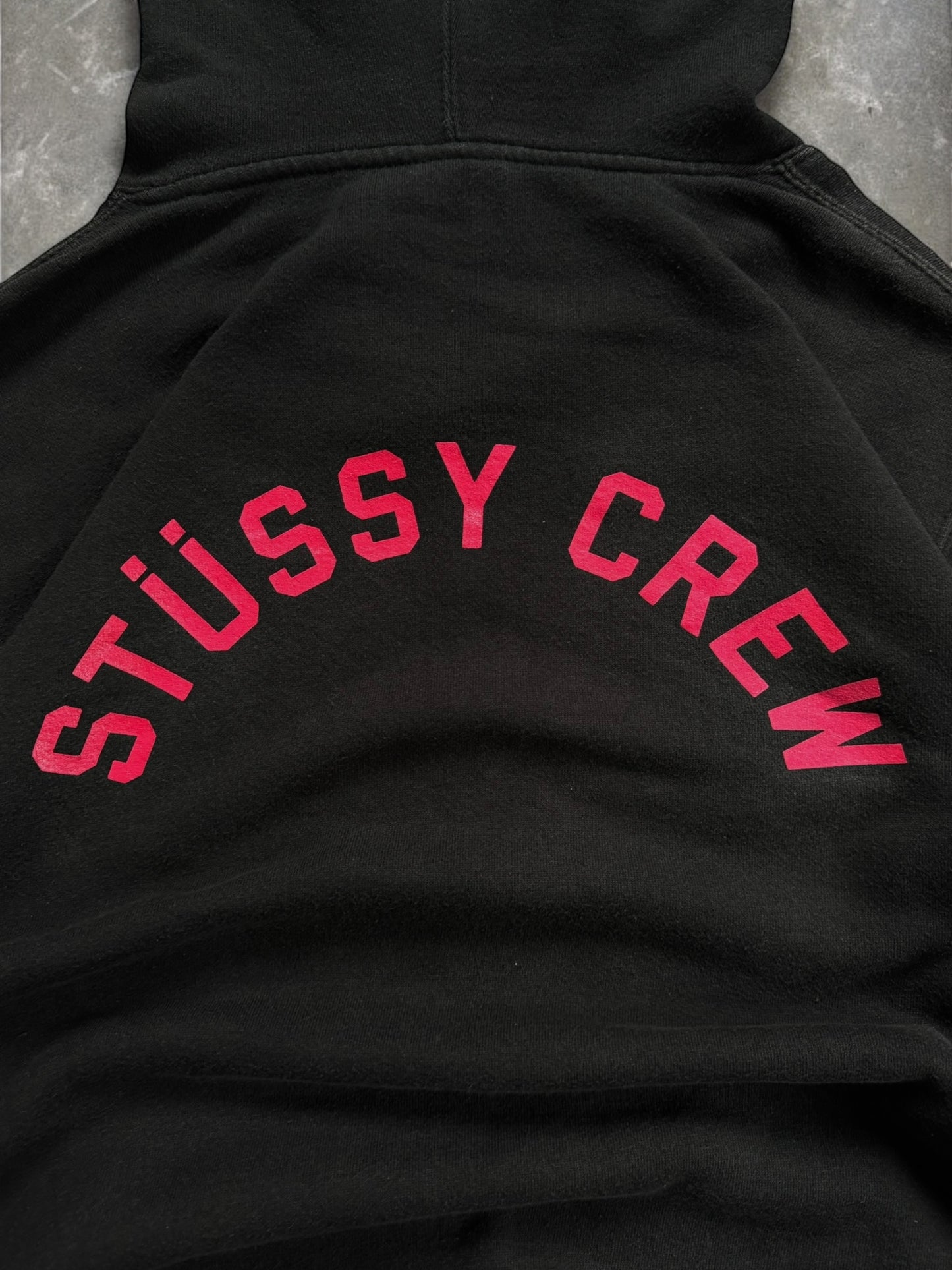 Vintage 2000's black and pink Stussy graphic hoodie (L)