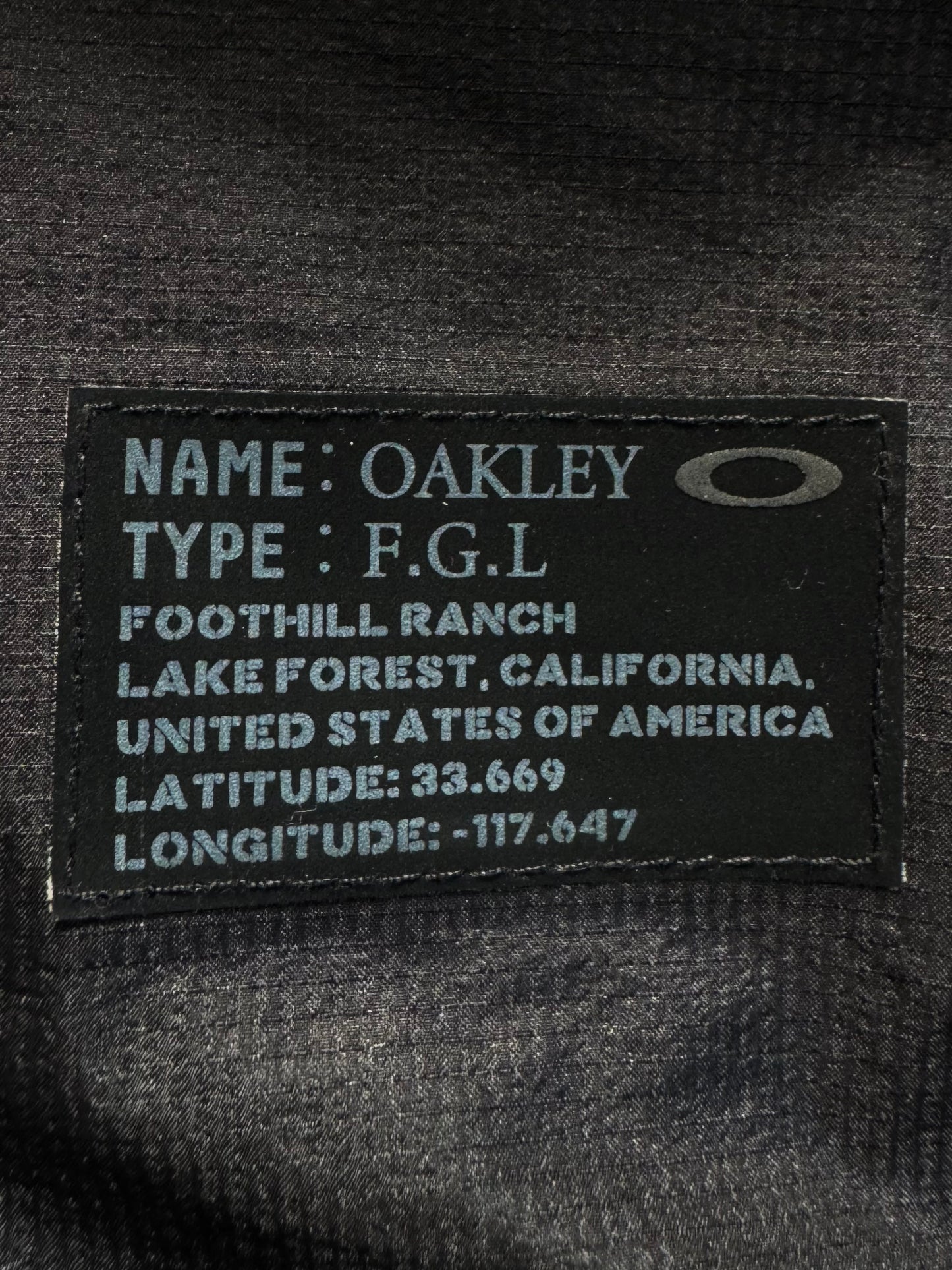 Vintage black Oakley FGL technical packable jacket (M)