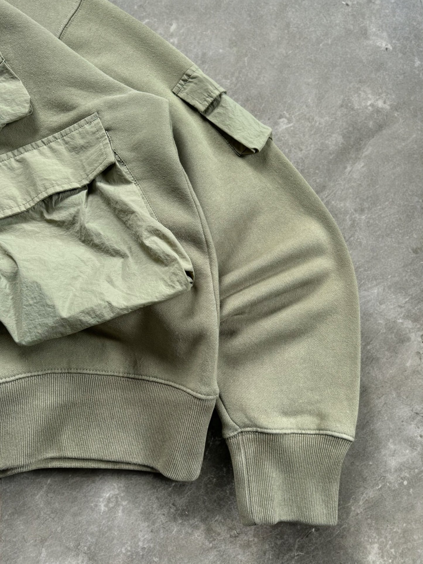 Vintage sage / khaki green Stussy technical cargo hoodie (M)