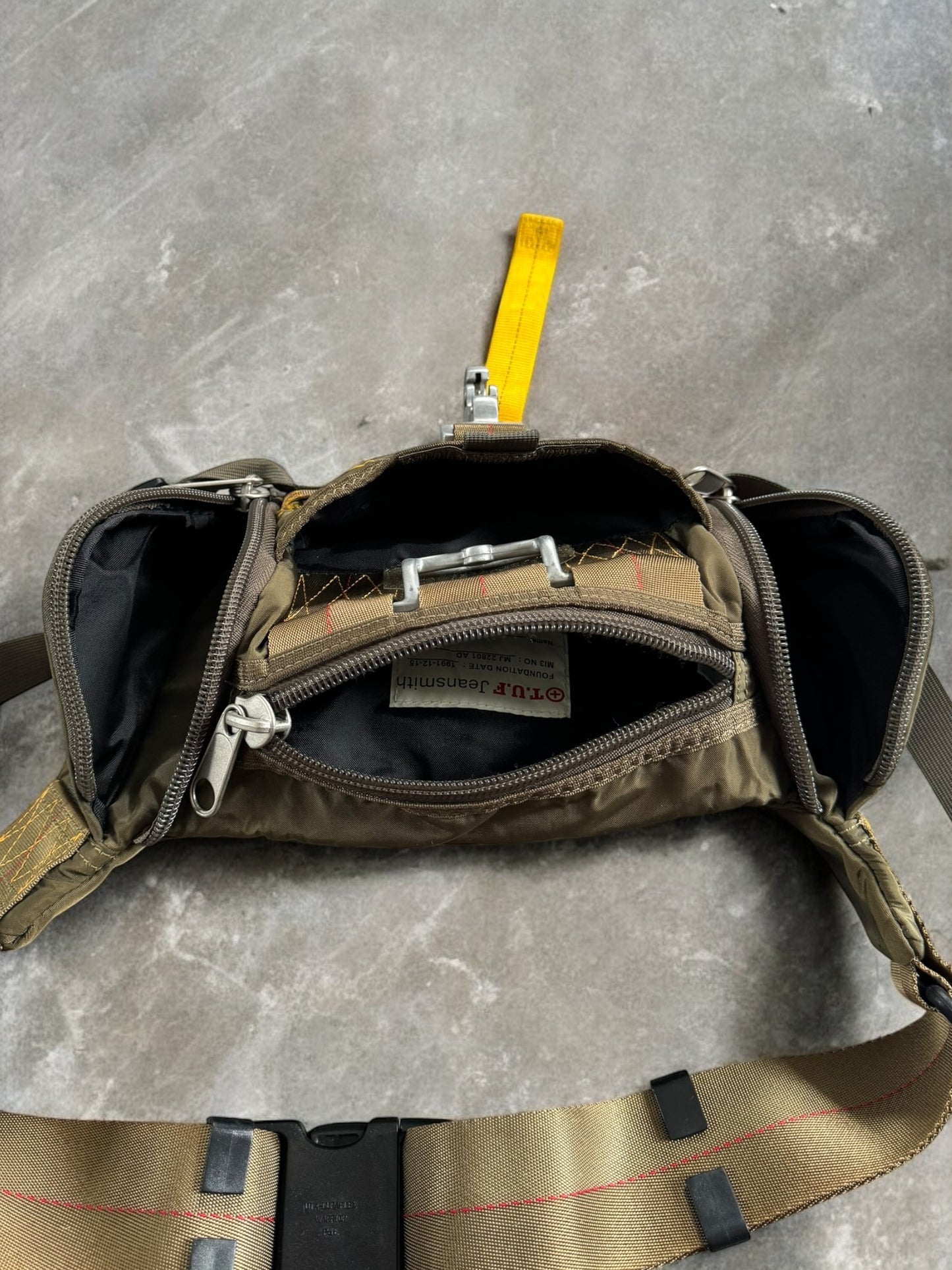 Vintage 90's archival Tough Jeans
INC technical sling bag / waist bag