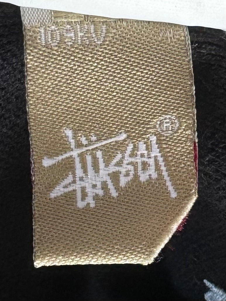 Vintage 2000's black stussy skull embroidered polo shirt (M)
