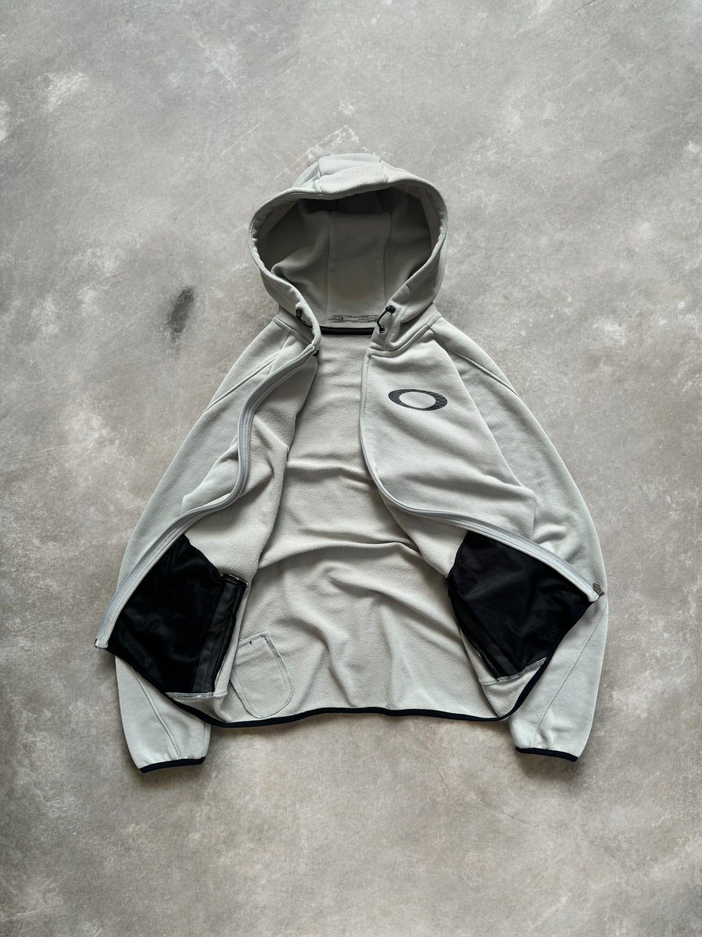 Vintage 2000's black and light grey Oakley graphic print logo zip up technical hoodie (M)