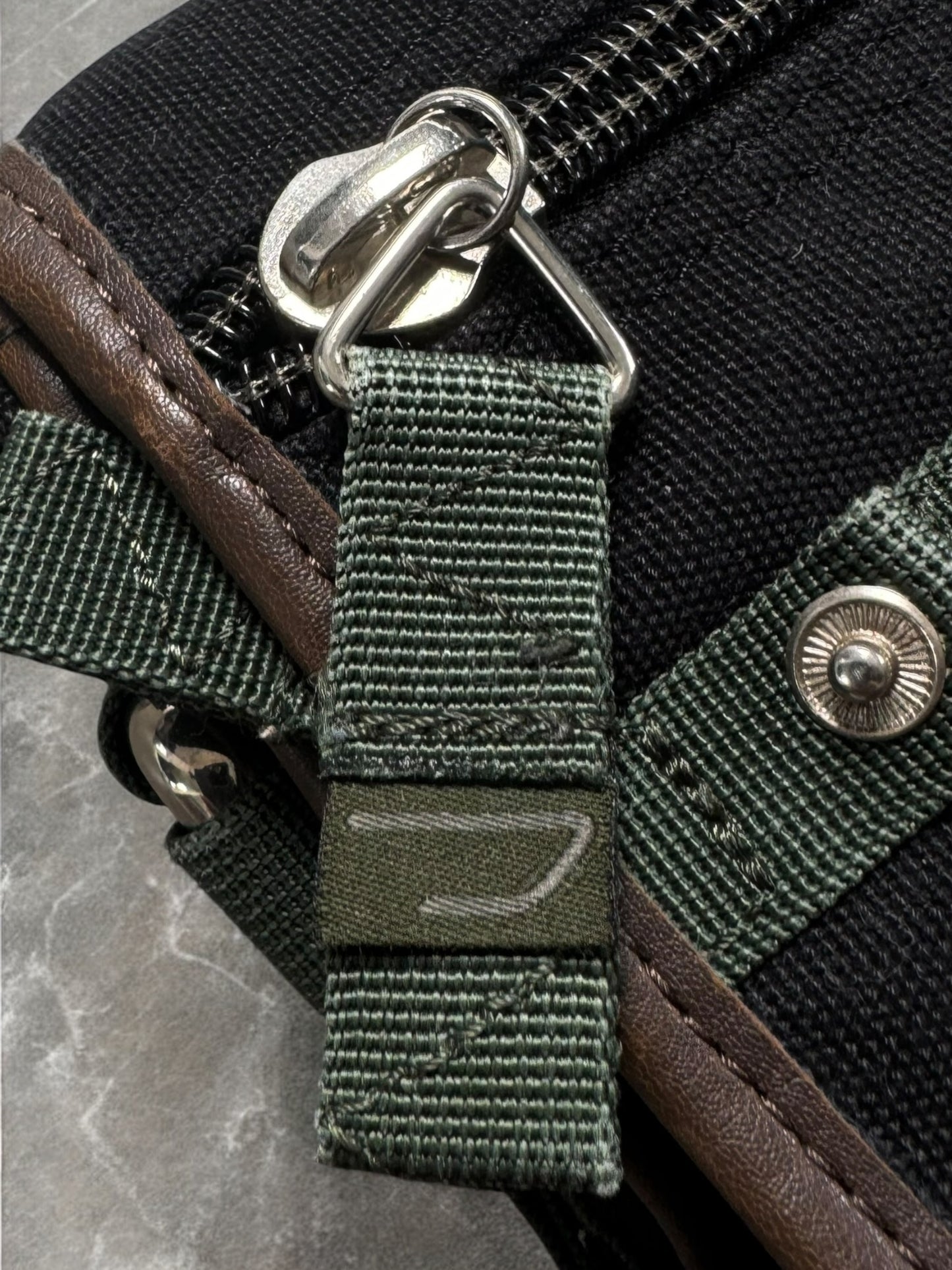 Vintage 2000's Y2K black and khaki green Diesel technical sling bag / crossbody bag