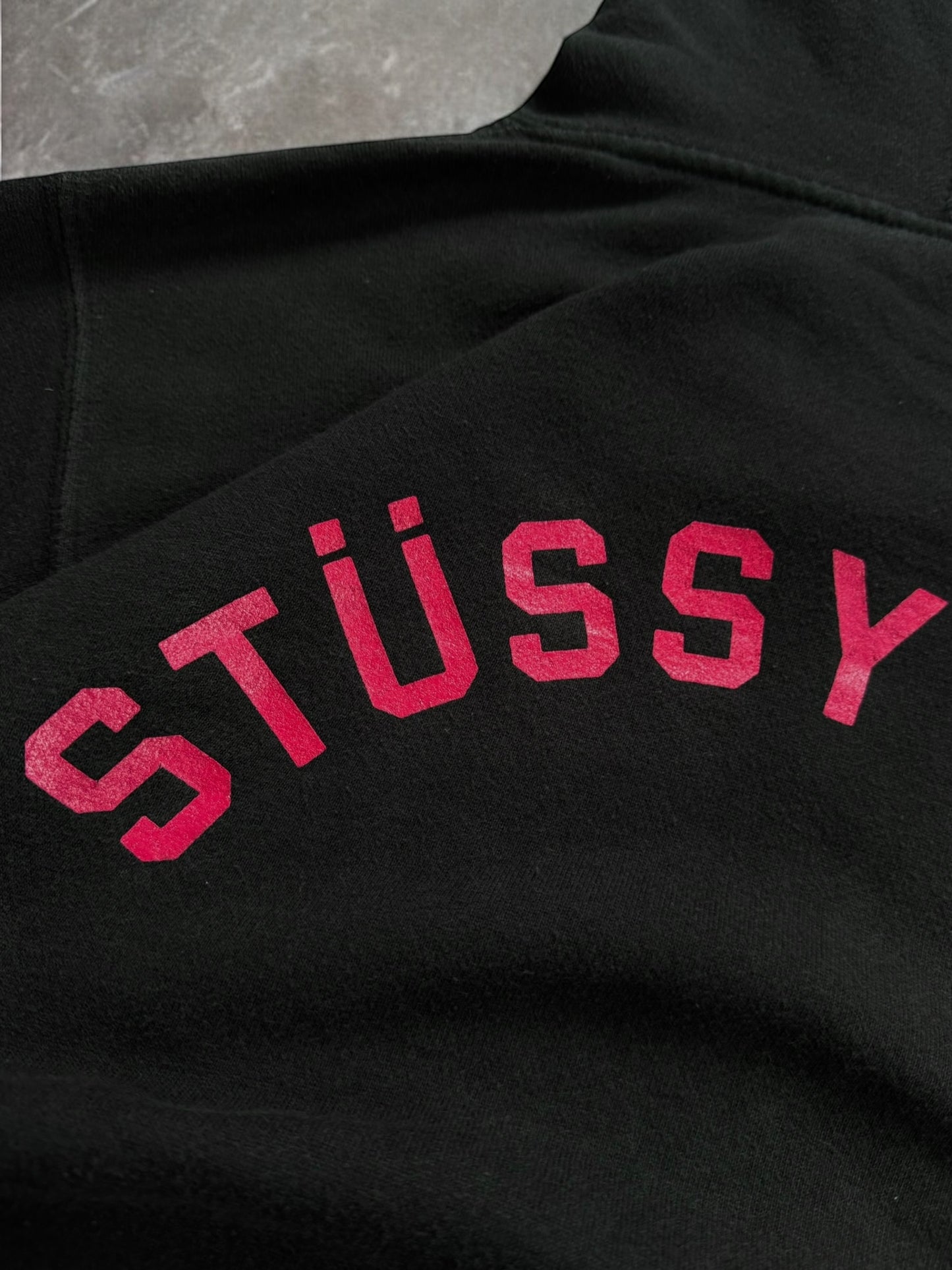 Vintage 2000's black and pink Stussy graphic hoodie (L)