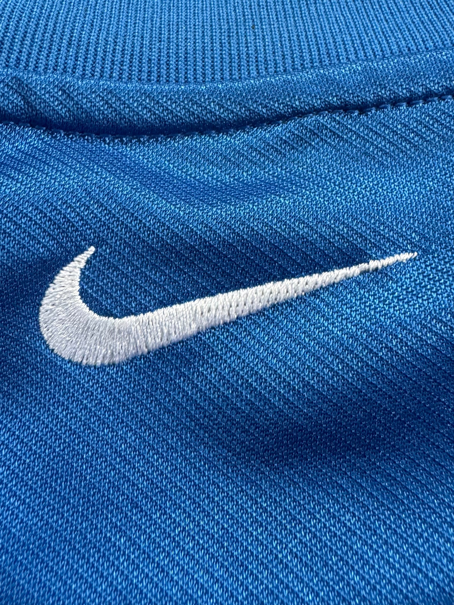 Vintage 2000's crystal blue Nike T90 embroidered swoosh crest logo technical panelled t shirt (L)