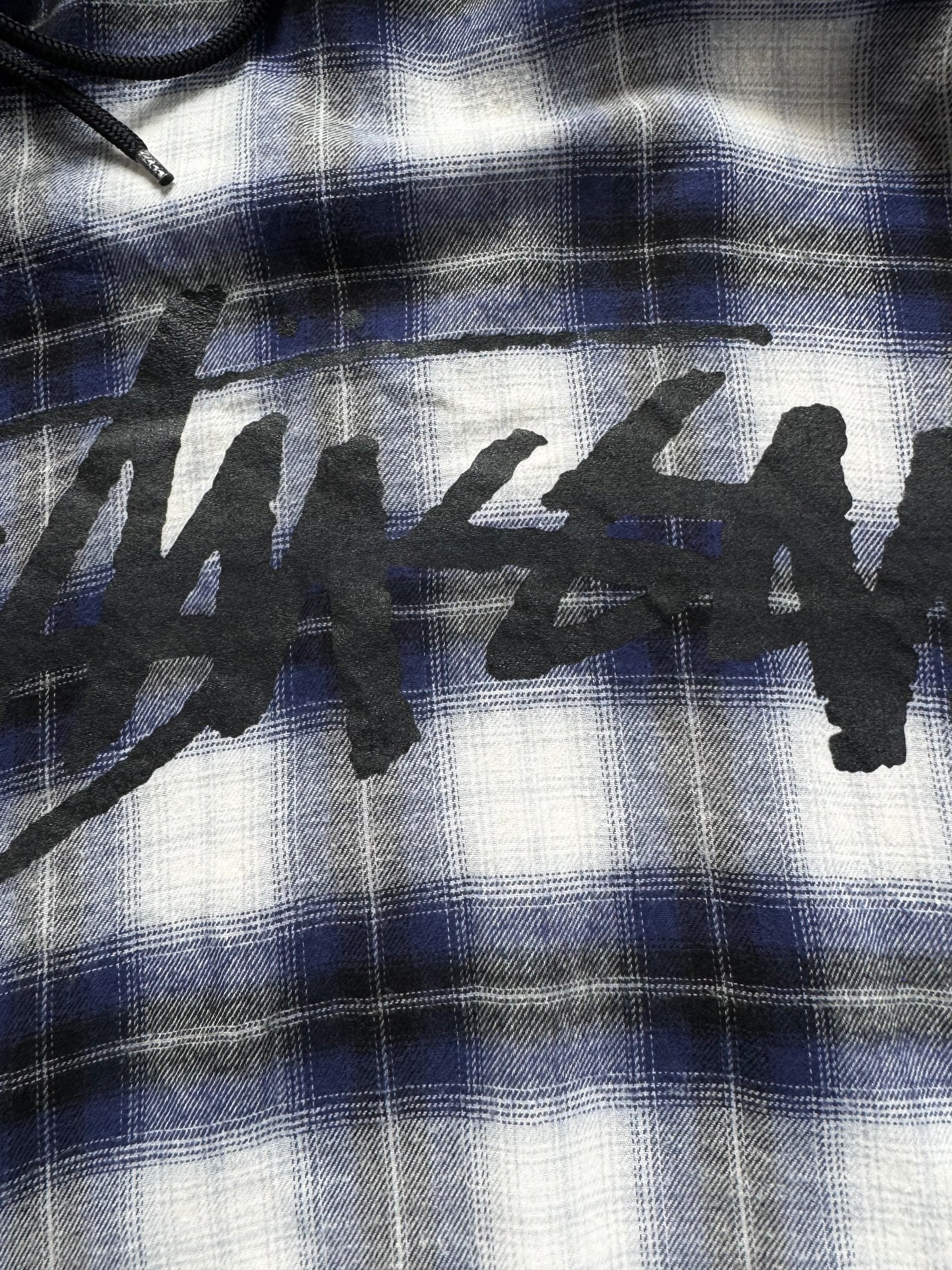 Vintage navy blue white and black Stussy spell out logo tartan / plaid hoodie (M)