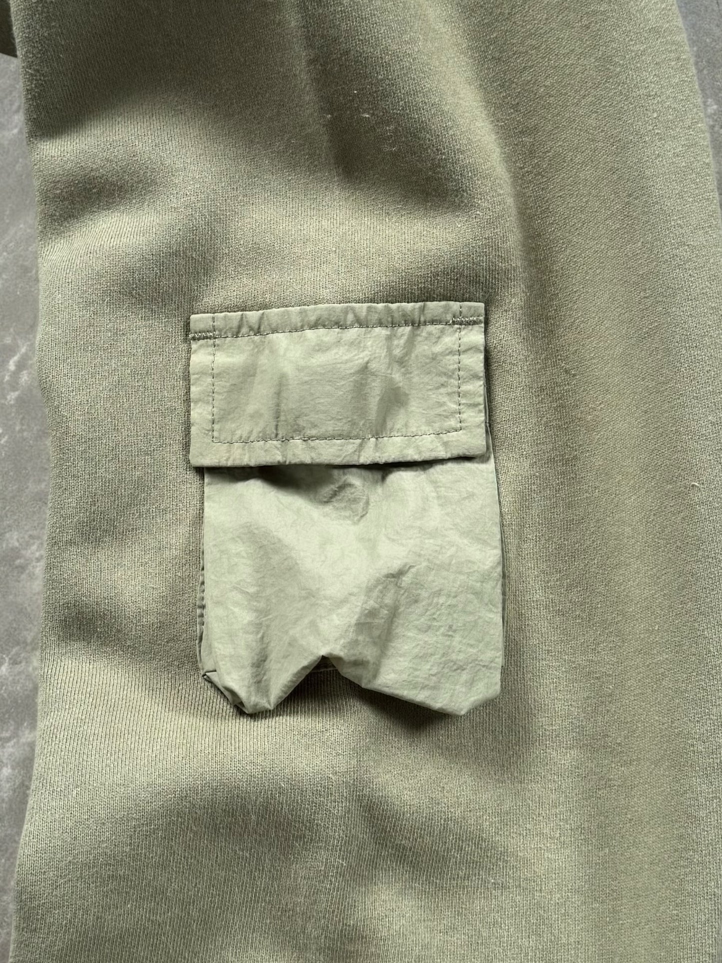 Vintage sage / khaki green Stussy technical cargo hoodie (M)