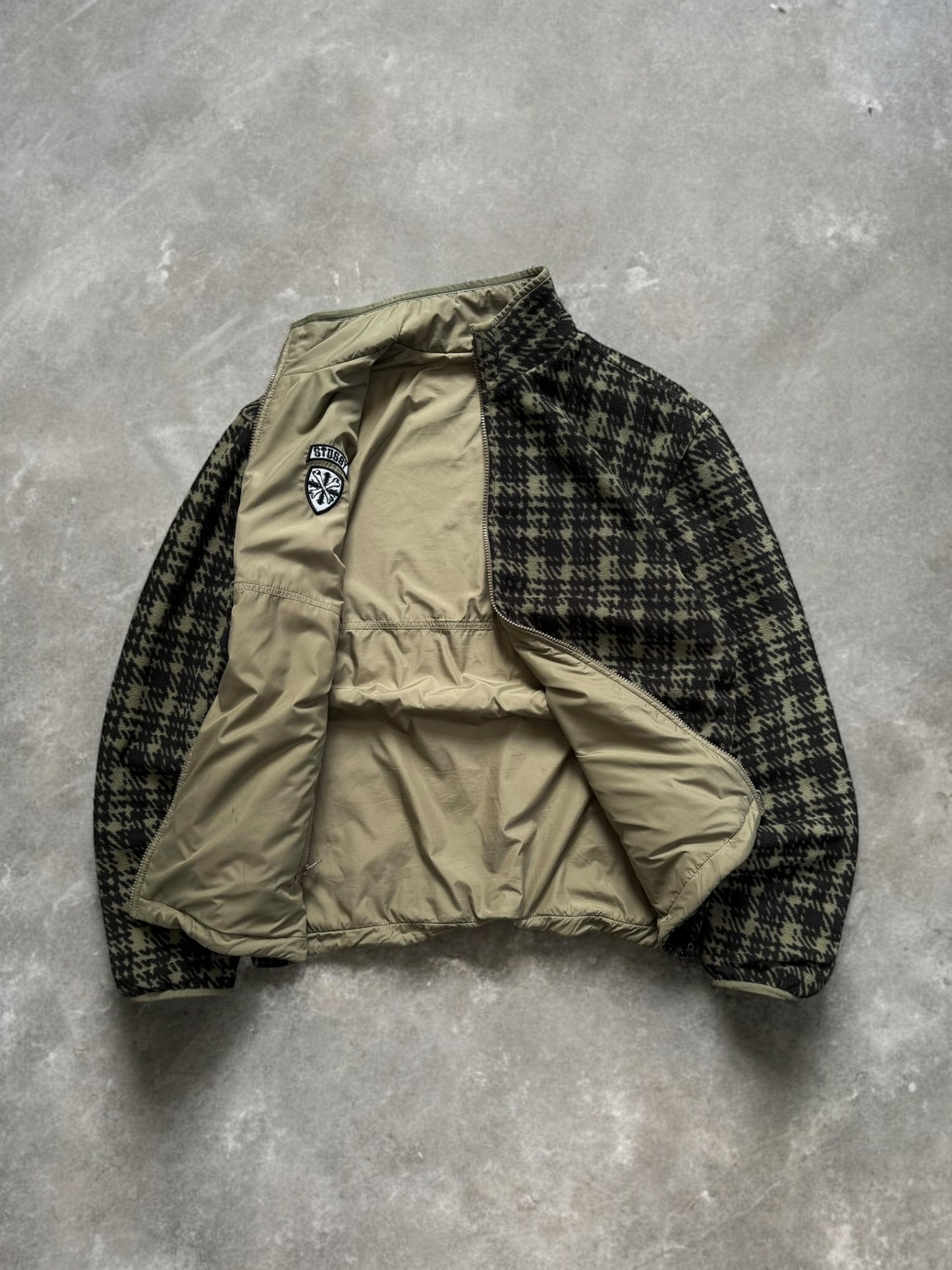 Vintage 2000's khaki green and black Stussy reversible plaid / tartan technical jacket (M)