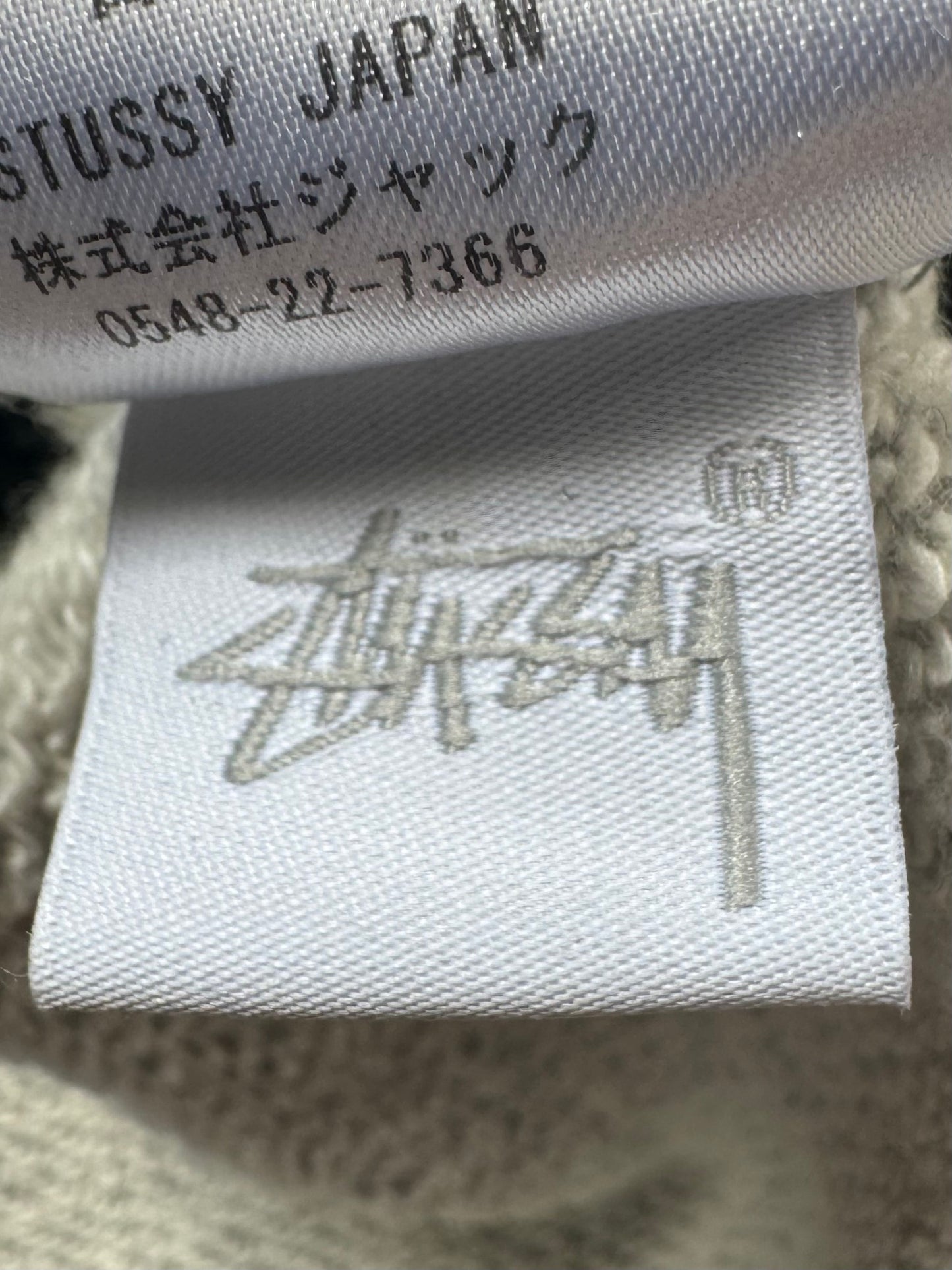 Vintage 2000's grey white and black Stussy tartan plaid jumper (S)