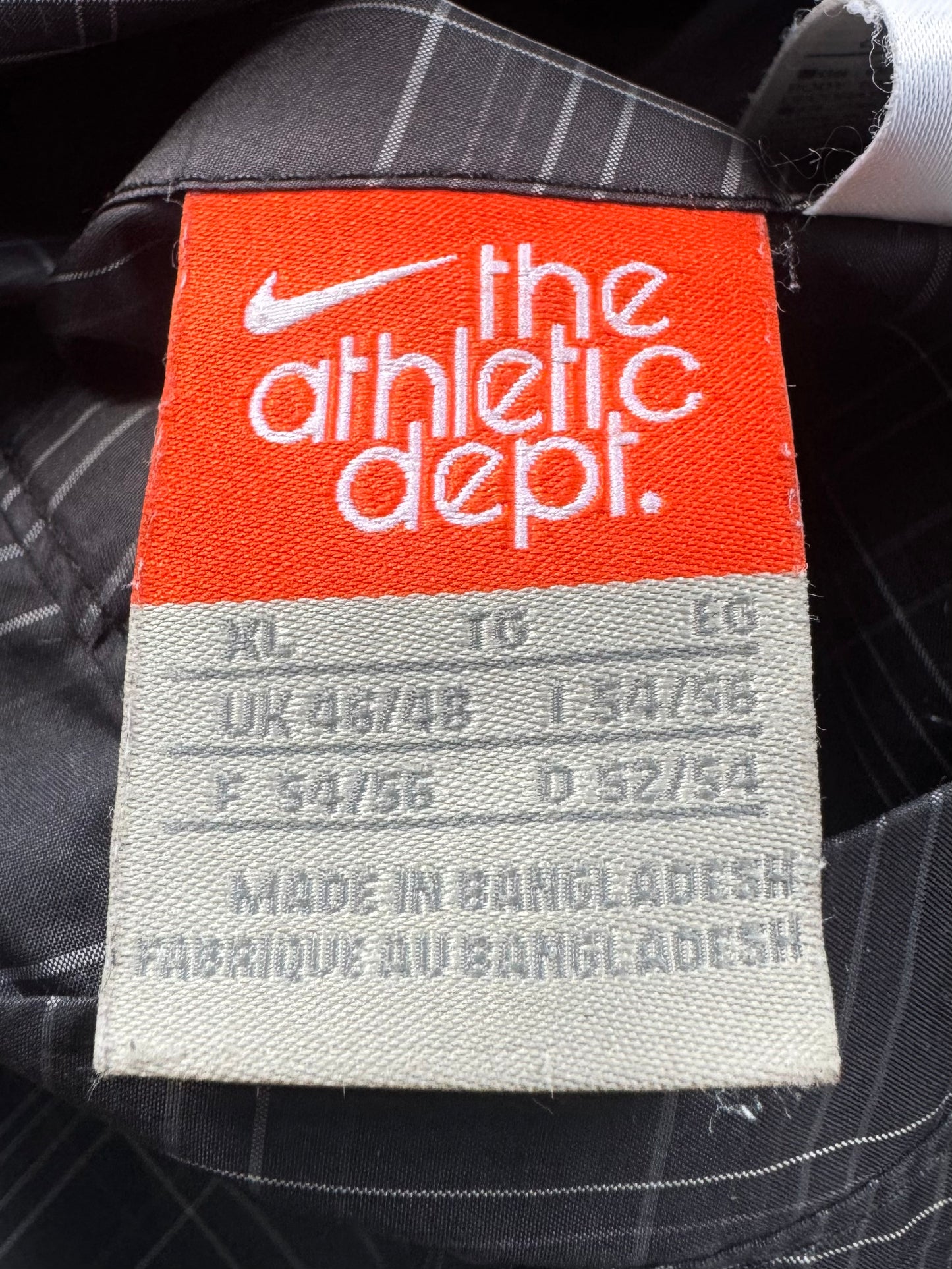 Vintage 2000's black and grey Nike embroidered swoosh logo tartan / plaid reversible technical jacket (XL)