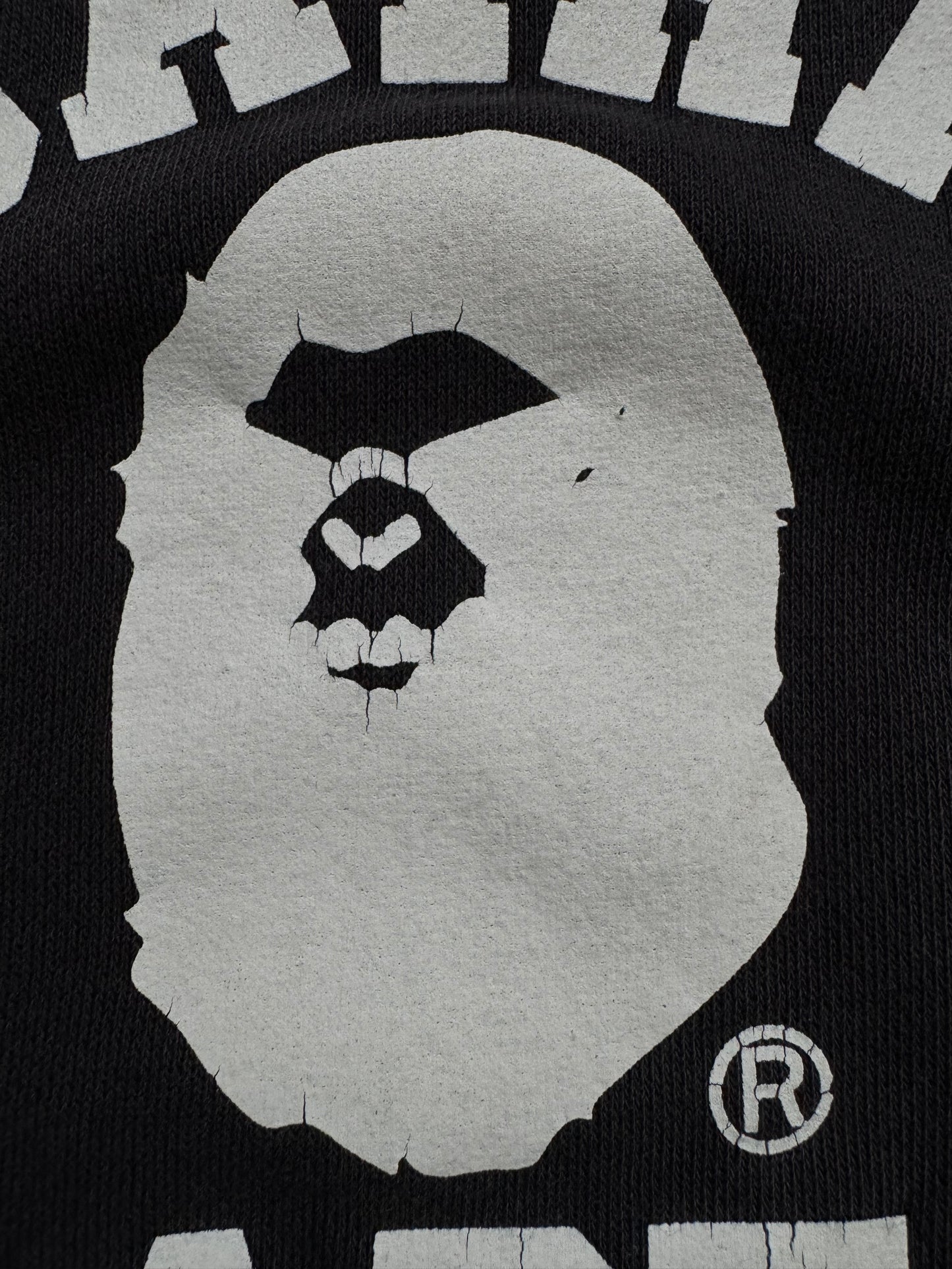 Vintage 90's faded black and white Bape graphic hoodie (L)