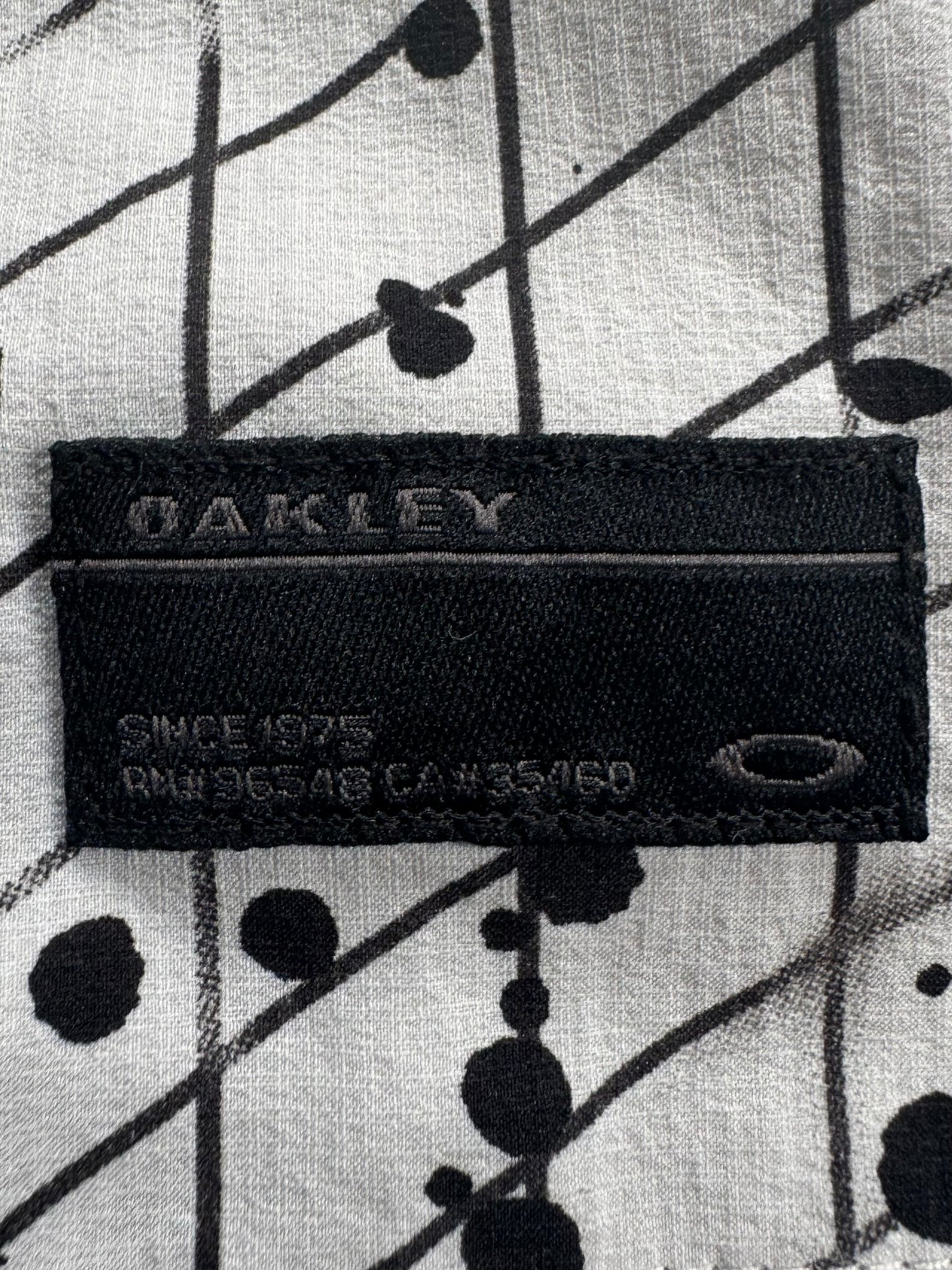 Vintage 2000's checkered snow camo Oakley technical jacket (S)
