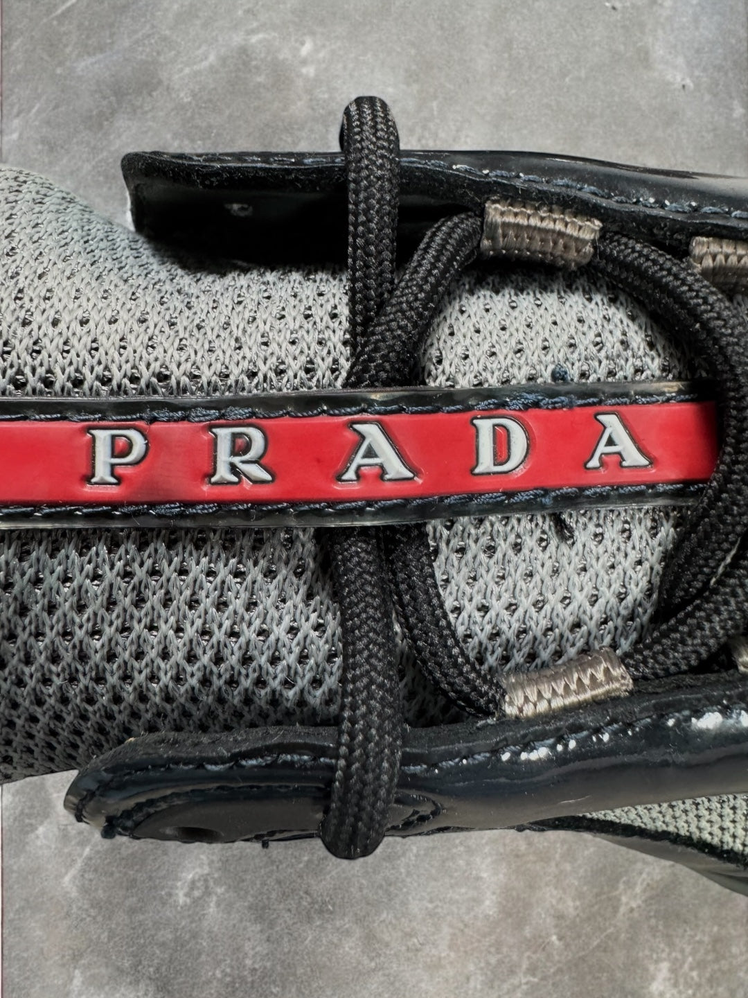 Vintage black and grey patent leather Prada America cup trainers (UK7)