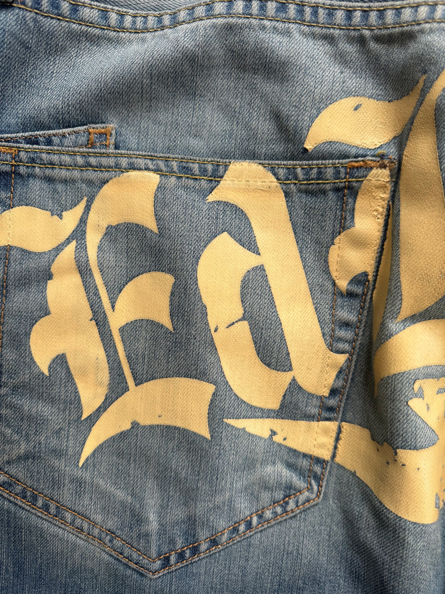 Vintage 2000's light blue Ed Hardy Christian Audiger distressed graphic jeans (L)