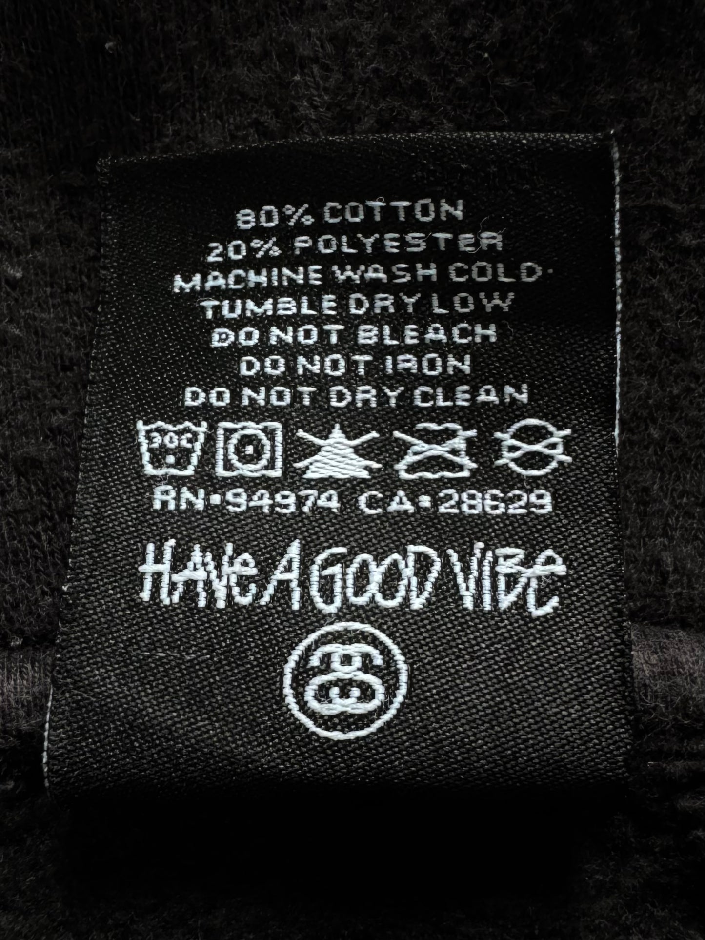 Vintage 2000's black and pink Stussy graphic hoodie (L)