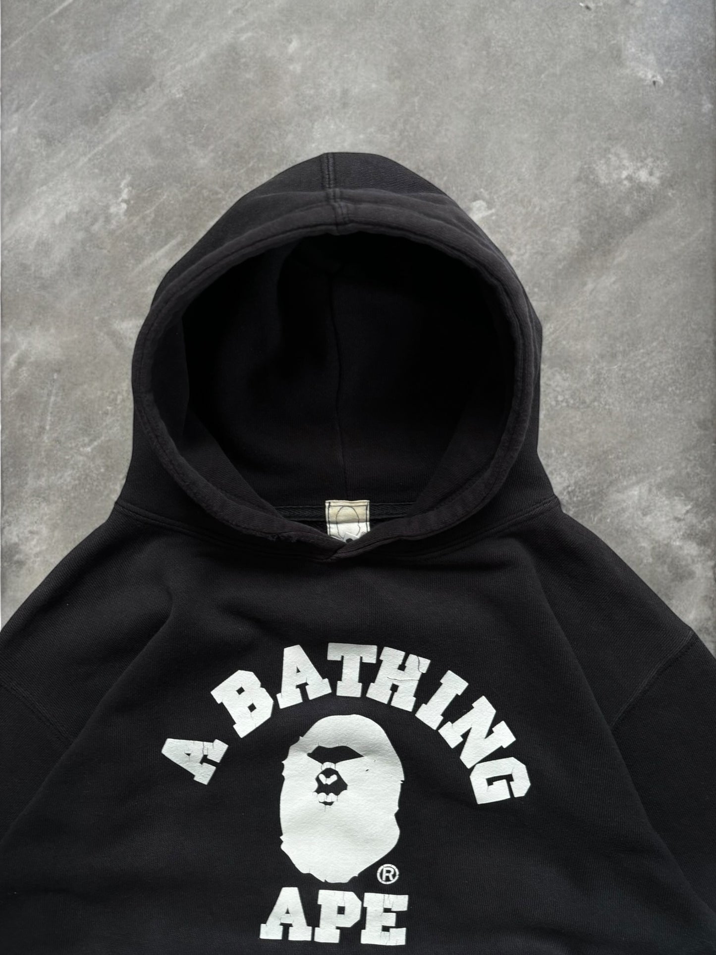 Vintage 90's faded black and white Bape graphic hoodie (L)